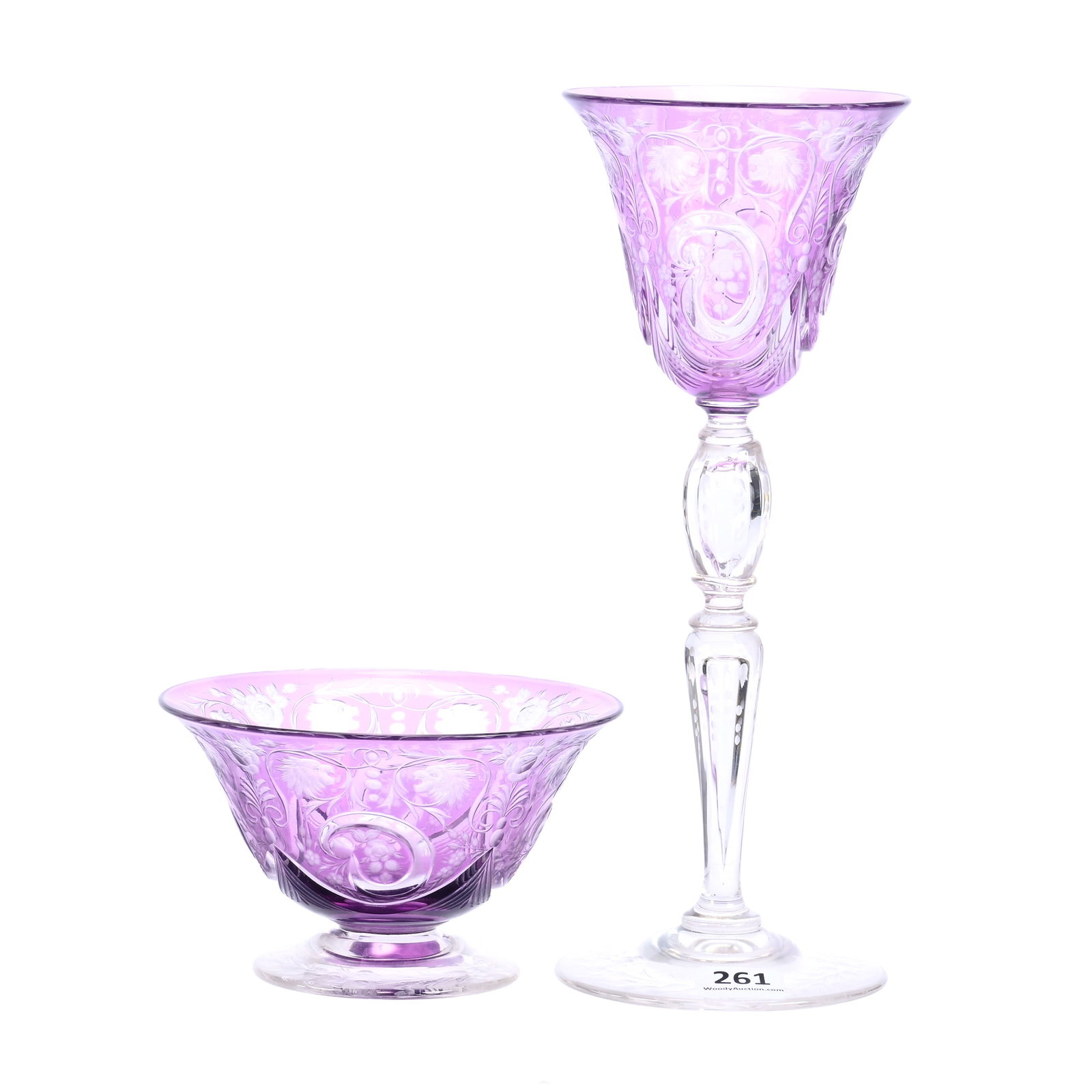 (2) Signed Steuben Art Glass Items, Engraved Lion's Head, Scroll And Floral Design: (2) Signed Steuben Art Glass Items, Engraved Lion's Head, Scroll And Floral Design, Amethyst Cut To Clear, (1) 9" X 3.5" Wine Stem, (1) 2.75" X 4.625" Sherbet, Virginia & The Late Dr. Jimmie L. Downin