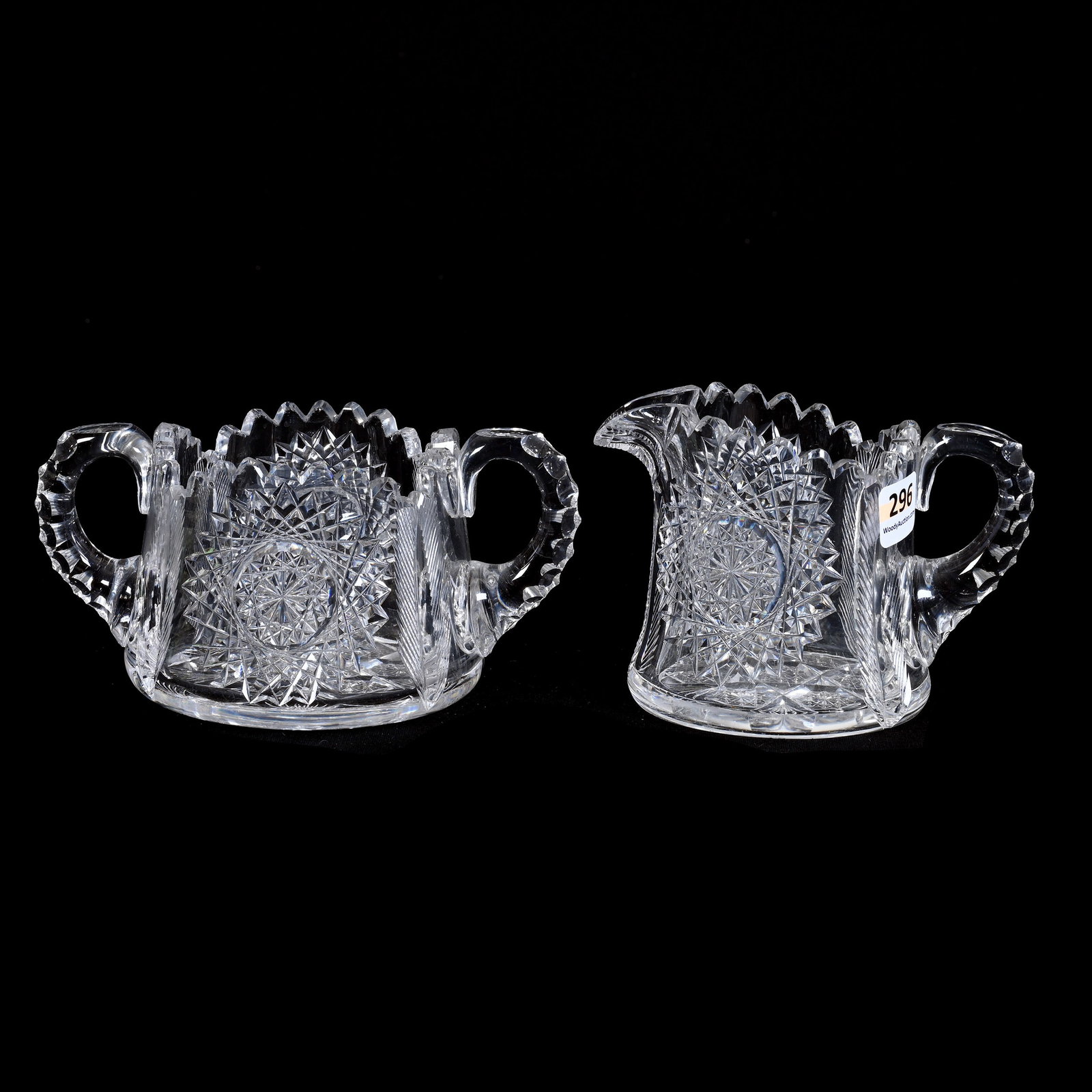 Creamer & Sugar Set, ABCG, Hobstar And Feather Motif, Hobstar Cluster Base: Creamer and Sugar Set, American Brilliant Cut Glass, Hobstar And Feather Motif, Hobstar Cluster Base, 3.5" x 6.25", Triple Notched Handles, Creamer With Chip On Spout, Collection Of David Fuchshuber, 