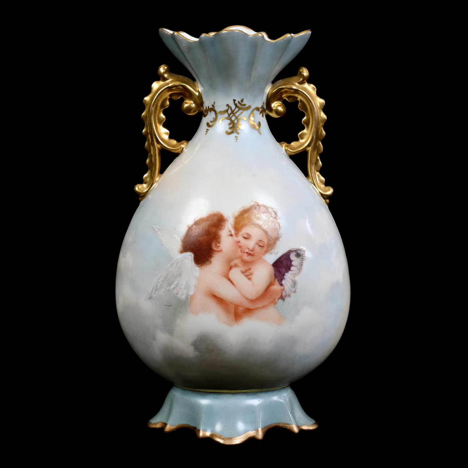 Vase Marked M. R. Limoges, Boy Cherub With Dove Wings Kissing Girl Cherub W/Butterfly Wings: Vase Marked M. R. Limoges, Boy Cherub With Dove Wings Kissing Girl Cherub W/Butterfly Wings, 10.25" x 6" x 4.25", Blue And White Tones, Artist Signed Kramer, Dated 1898, Some Gold Touch-Up On Base Rim