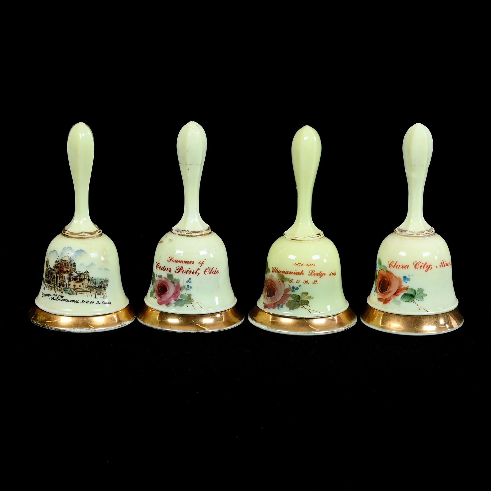 (4) Custard Glass Bells, Souvenirs Including:: (4) Custard Glass Bells, Souvenirs Including:, 6.25" x 3.25", (1) Chananiah Lodge, (1) St. Louis Cathedral, (1) Cedar Point, Ohio (No Clapper), (1) Clara City, Minnesota, Highly Reactive Under Black L