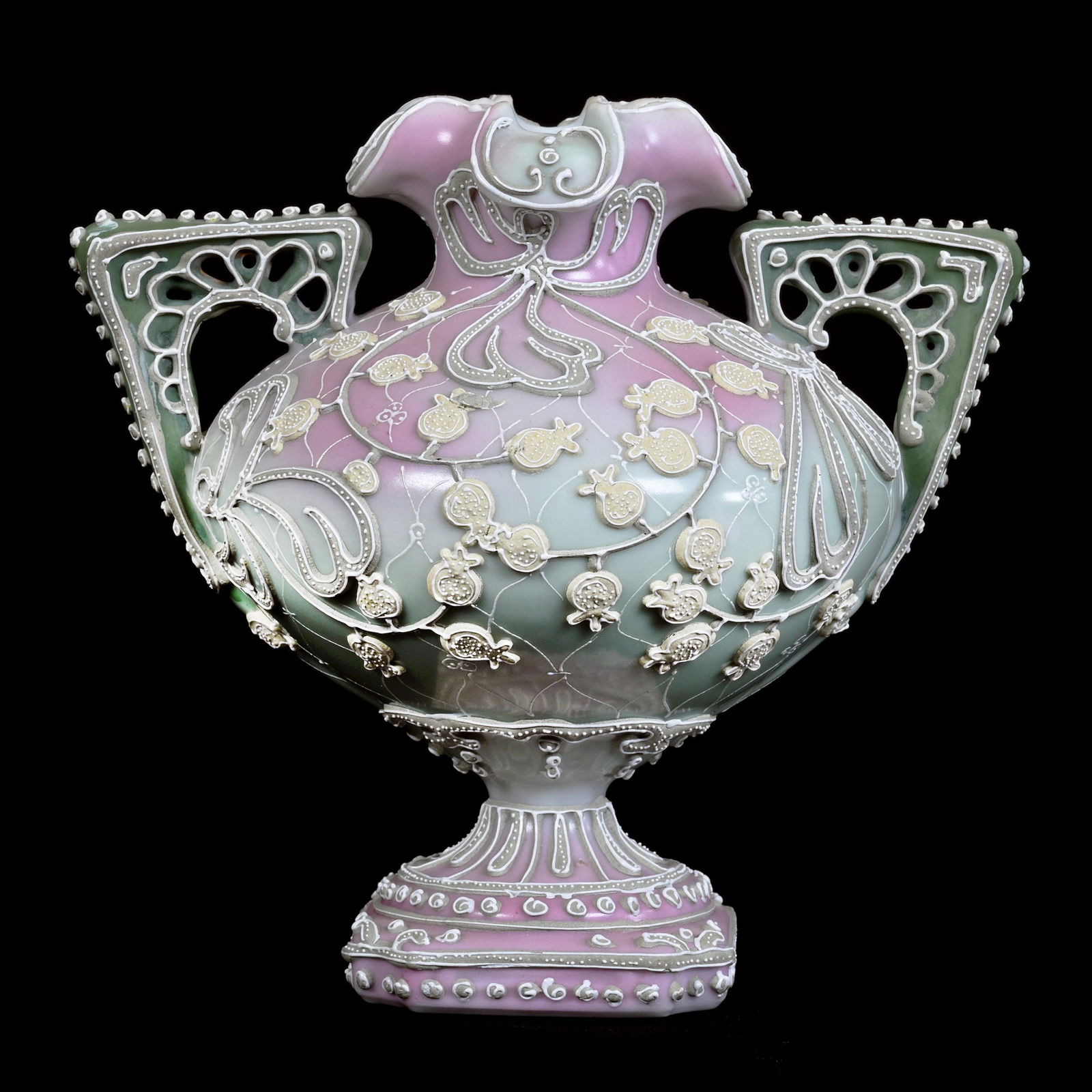 Pedestal Vase, Two Handles, Unmarked Nippon, Pink And Green Tones, Elaborate Moriaga Decor: Pedestal Vase, Two Handles, Unmarked Nippon, Pink And Green Tones, Elaborate Moriaga Decor, 6" x 6.5" x 5", Estate Of Marvin And Elfriede MIller, North Dakota.
