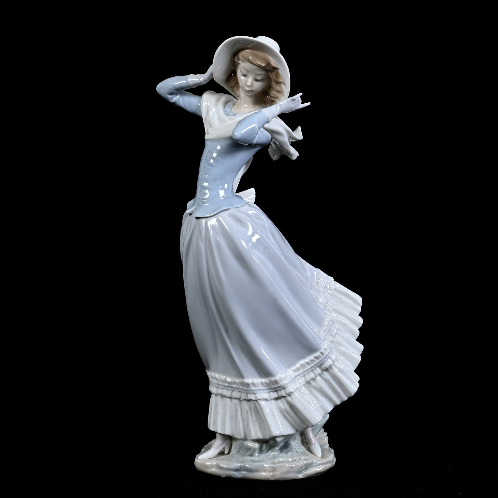 Figurine Marked Lladro Titled "Spring Breeze": Figurine Marked Lladro Titled "Spring Breeze", 13.5" x 6", Estate Of Marvin And Elfriede MIller, North Dakota.