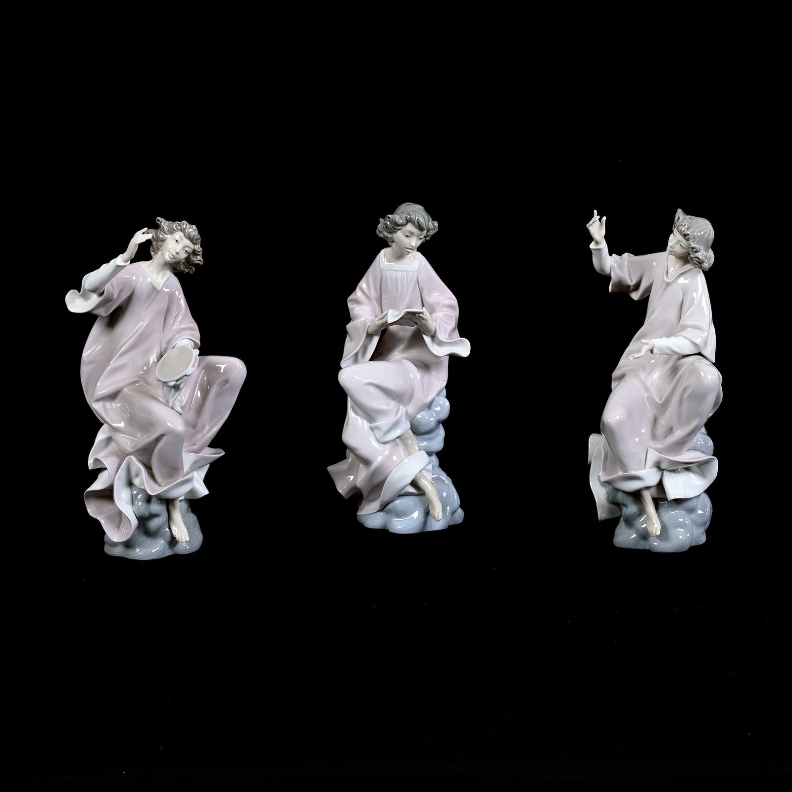 (3) Lladro Figurines, Musical Angels, One Holding Sheet Music, One Holding Tambourine (Head Repair): (3) Lladro Figurines, Musical Angels, One Holding Sheet Music, One Holding Tambourine (Head Repair), 11" approximately, One Clapping Hands Which Should Have Tambourine But Does Not, Estate Of Marvin A