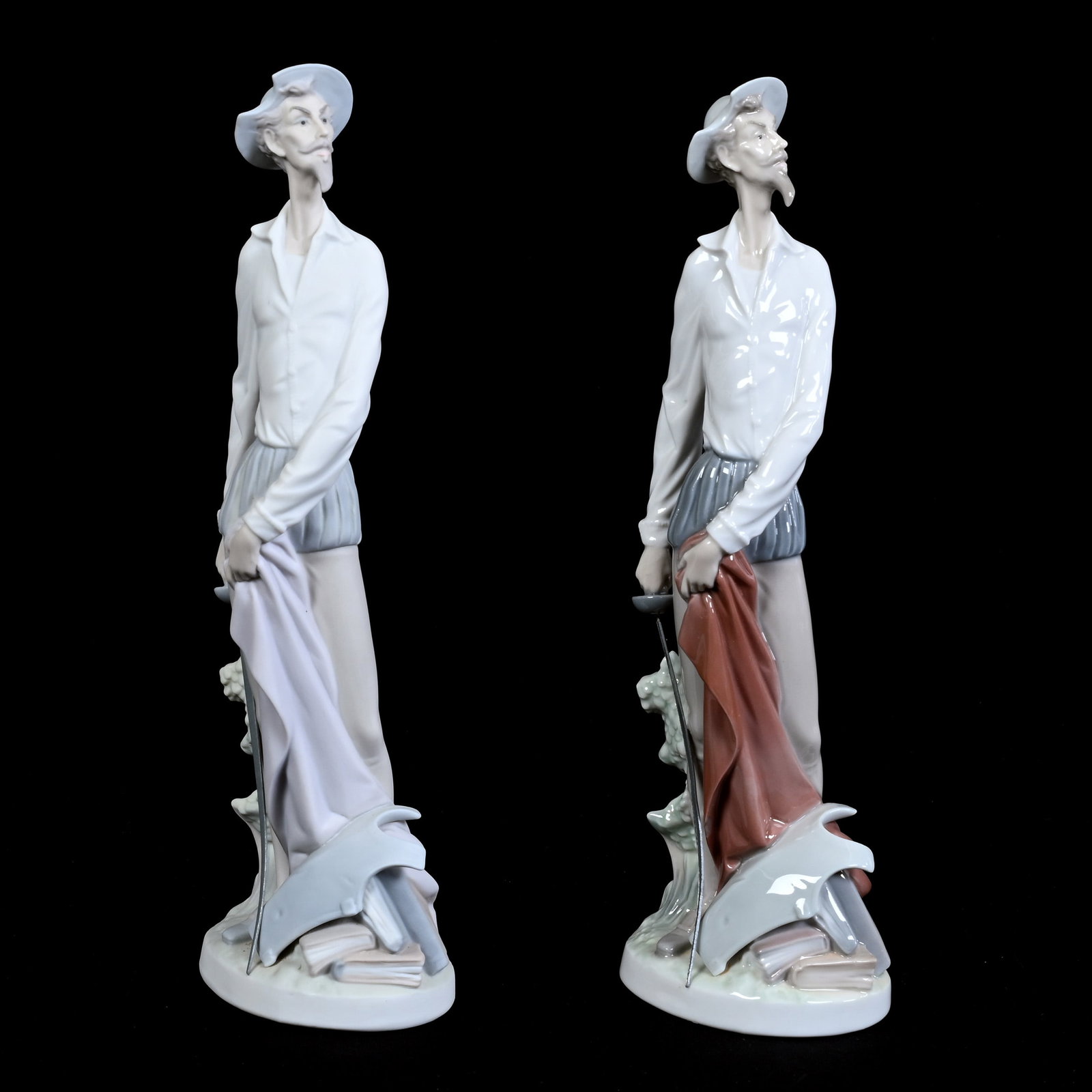 Pair Figurines Marked Lladro Titled "Don Quixote Standing Up" #4854: Pair Figurines Marked Lladro Titled "Don Quixote Standing Up" #4854, 11.75" x 3.75", One With Matte Finish, One With Gloss Finish, Estate Of Marvin And Elfriede MIller, North Dakota.