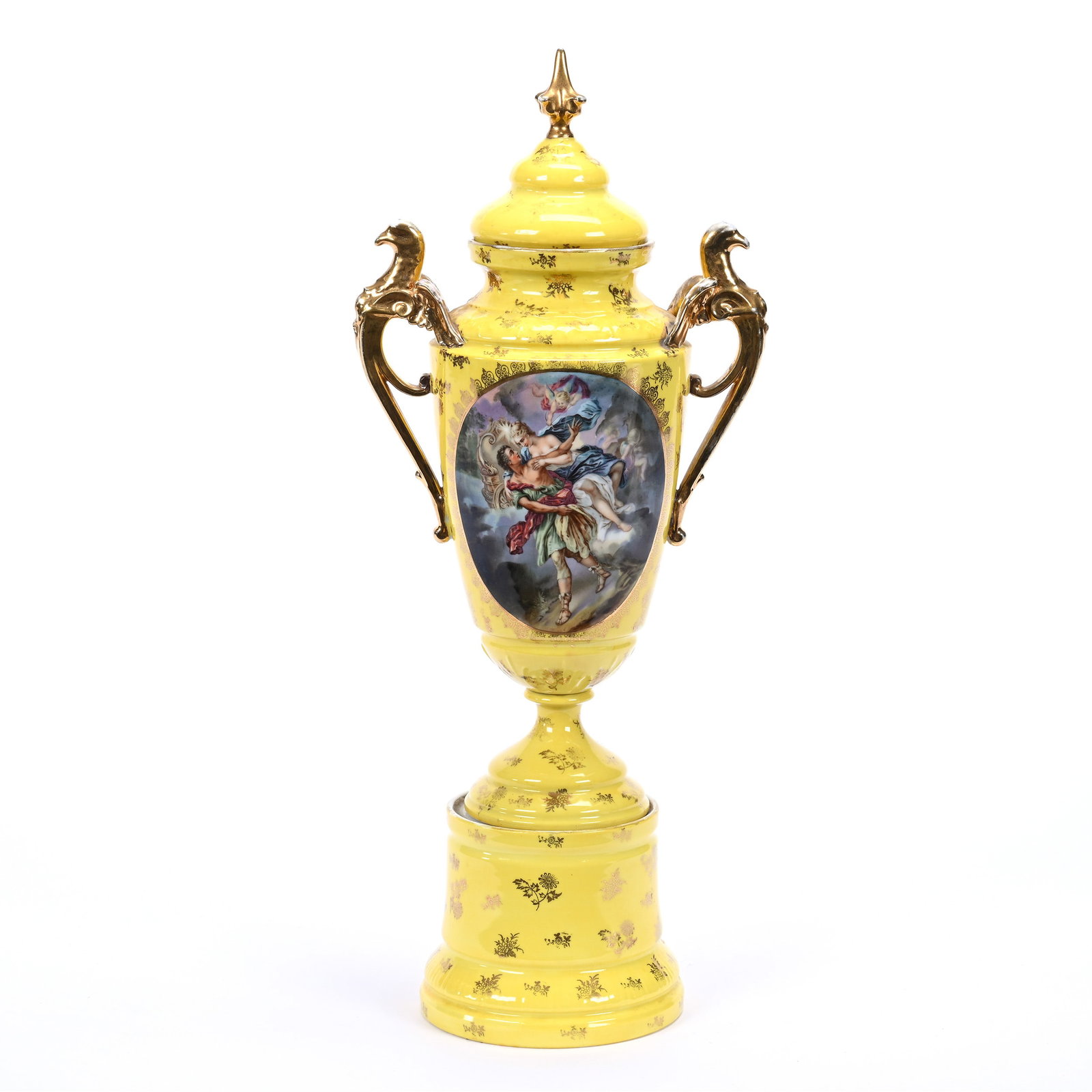 Pedestal Two Handled Covered Urn: Pedestal Two Handled Covered Urn, 19" x 8", Unmarked Germany, Yellow Background With Medallion Mythological Scene, Heavy Gold Stenciled Highlights, Kansas Private Collection.