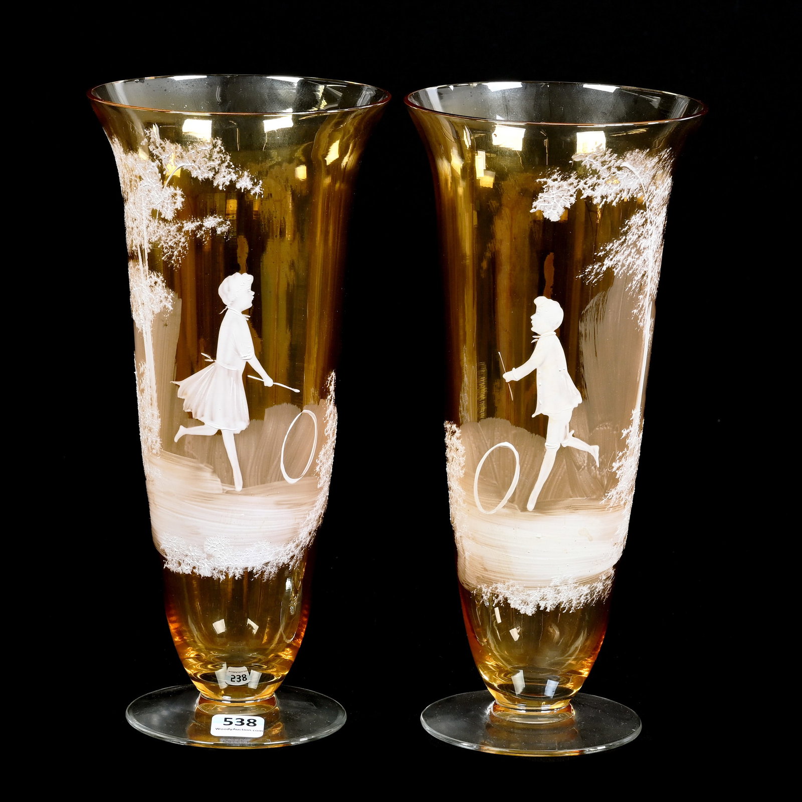 Pair Pedestal Vases, Marigold Body, Clear Foot, Enamel Mary Gregory Decor: Pair Pedestal Vases, Marigold Body, Clear Foot, Enamel Mary Gregory Decor, 10.75" x 5", Boy And Girl Playing Hoops, Collection Of The Late T. J. Wilson, Oklahoma. Mr. Wilson Marked The Majority Of His