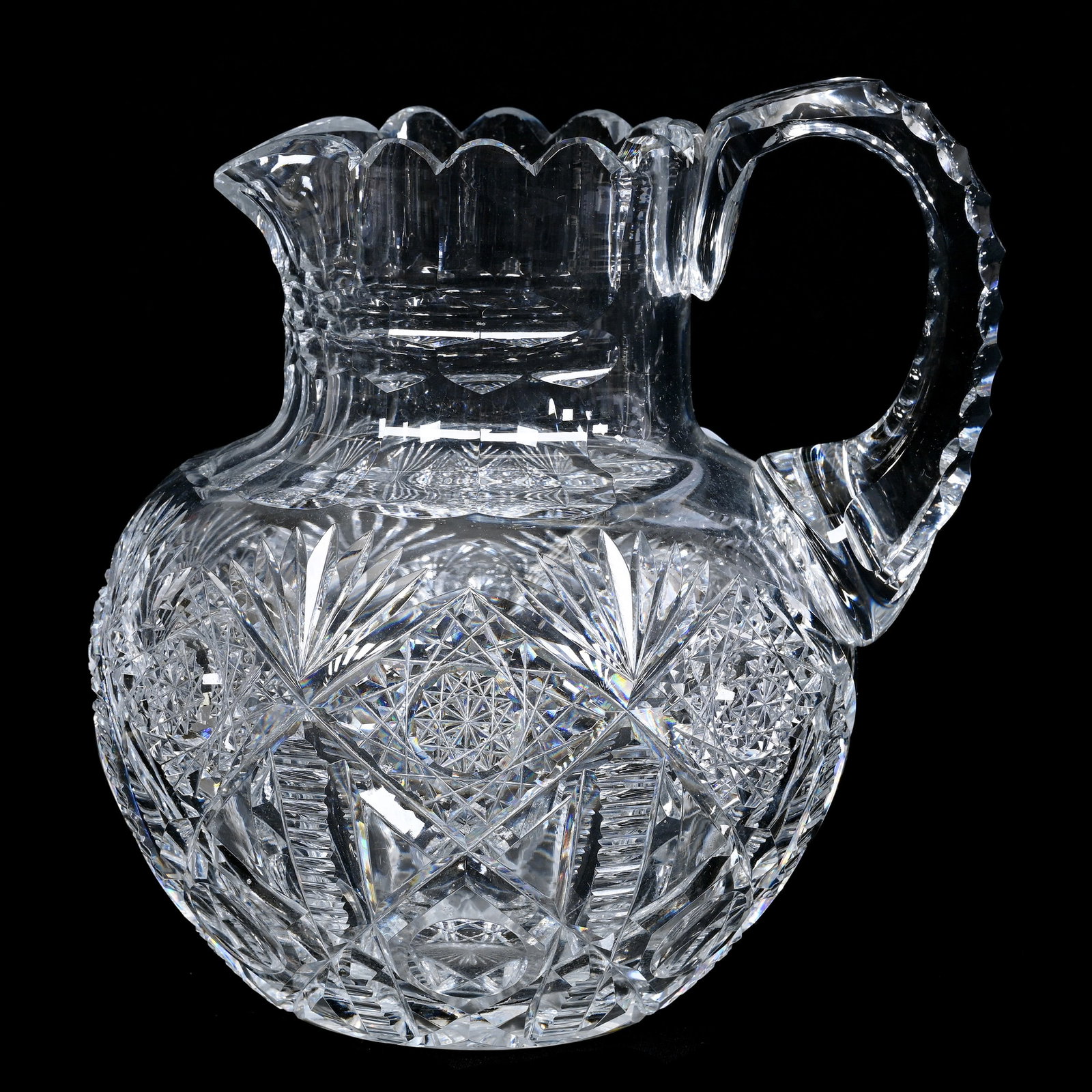 Pitcher, American Brilliant Cut Glass, Signed Hawkes Navarre Pattern: Pitcher, American Brilliant Cut Glass, Signed Hawkes Navarre Pattern, 8" x 7", Triple Notched Handle, Ray Cut Base, Collection Of The Late T. J. Wilson, Oklahoma. Mr. Wilson Marked The Majority Of His