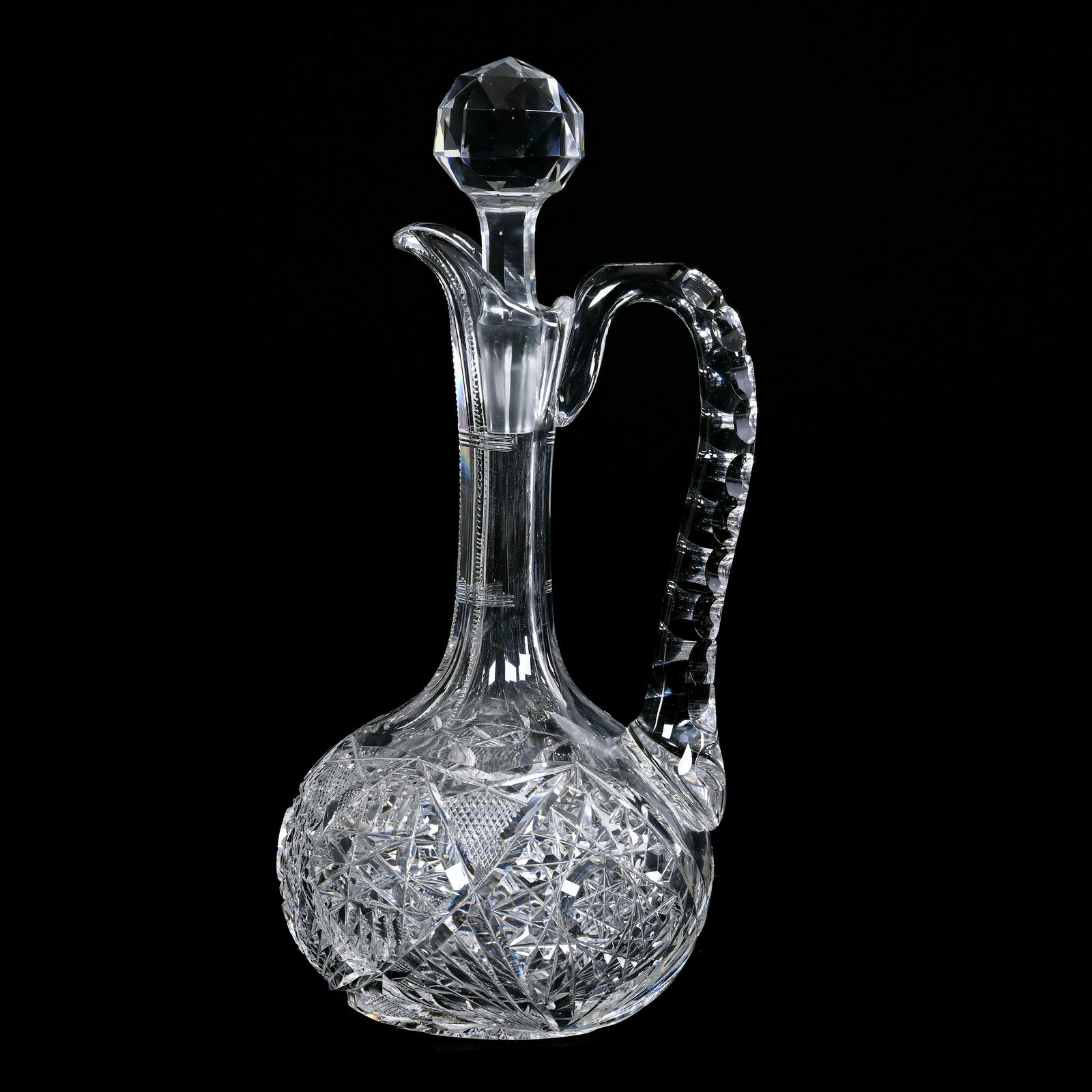 Decanter, American Brilliant Cut Glass, Hobstar, Strawberry Diamond And Fan Motif: Decanter, American Brilliant Cut Glass, Hobstar, Strawberry Diamond And Fan Motif, 12" x 5.5", Double Notched Handle, Ray Cut Base, Collection Of The Late T. J. Wilson, Oklahoma. Mr. Wilson Marked The