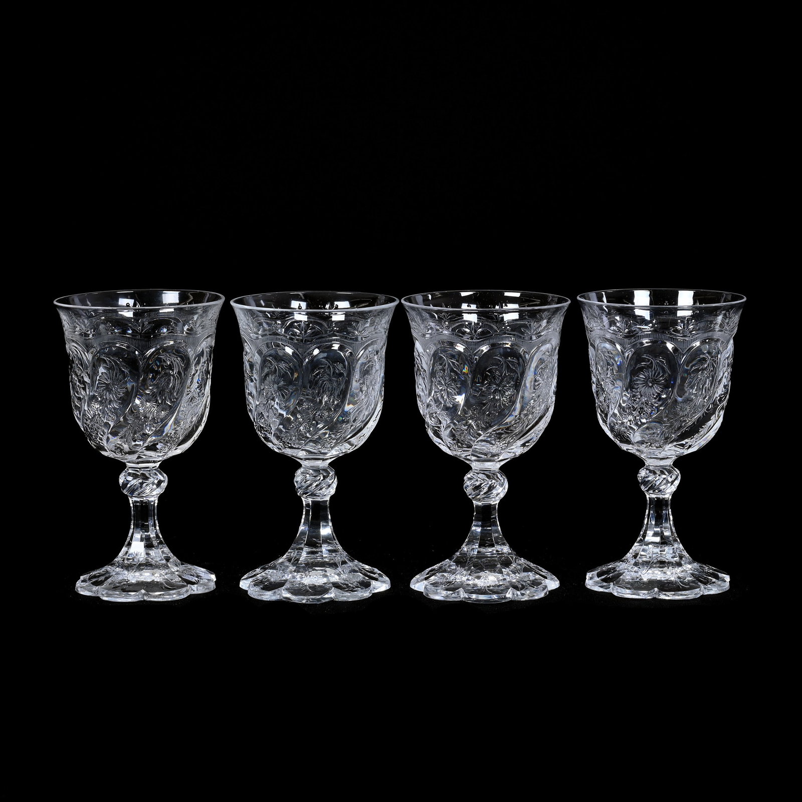 (4) Wine Stems, Cut Glass, Rock Crystal Swirled Tusk With Finely Engraved Floral Highlights: (4) Wine Stems, American Brilliant Cut Glass, Rock Crystal Swirled Tusk With Finely Engraved Floral Highlights, 5.5" x 3.25", Pattern Engraved Petticoat Scalloped Foot, Nice Set, Collection Of The Lat