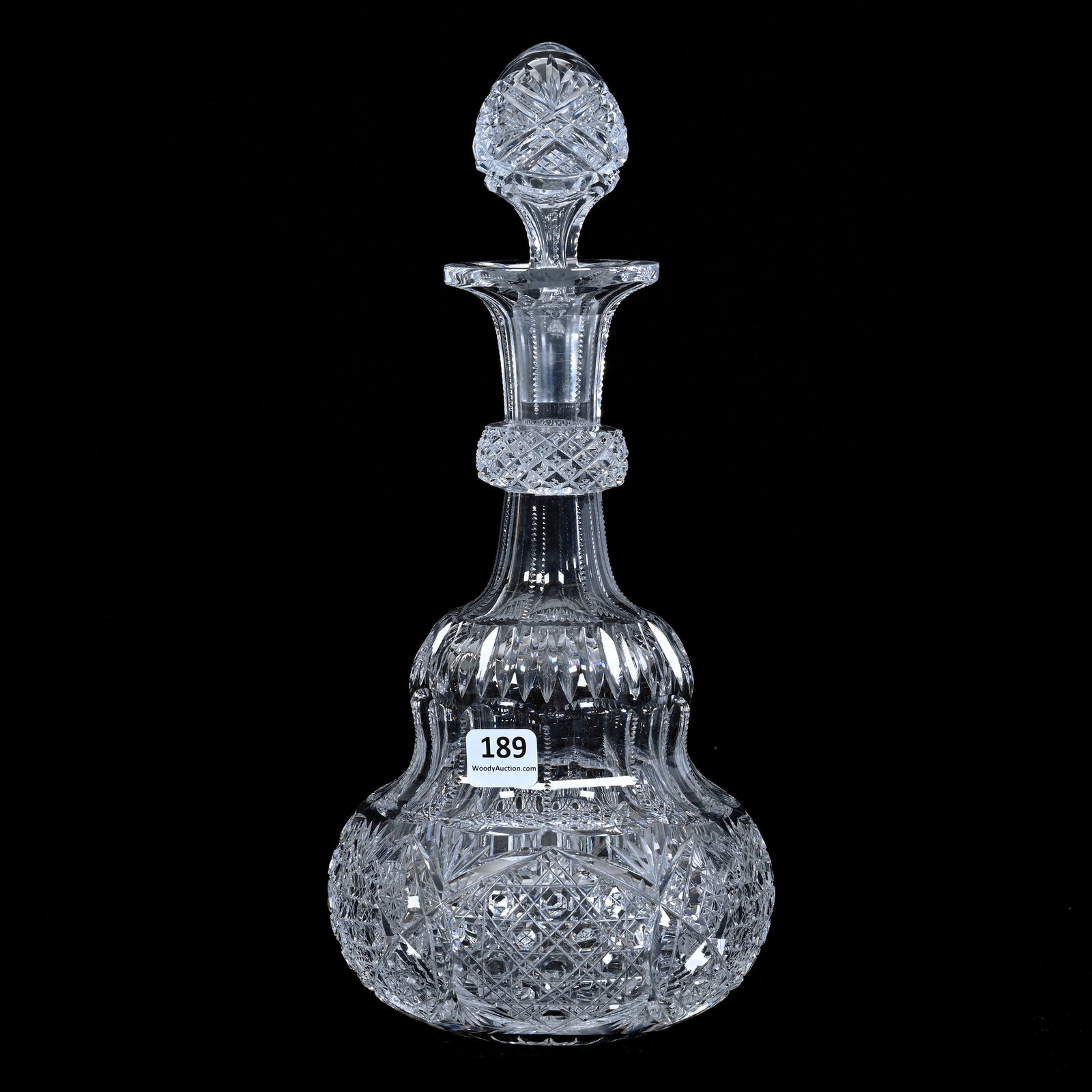 Decanter, Gourd Shape, Cut Glass, Cane, Vesica, Hobstar, Miter & Fan Motif: Decanter, Gourd Shape, American Brilliant Cut Glass, Cane, Vesica, Hobstar, Miter & Fan Motif, 12" x 5.5", Crosscut Diamond Ring Neck, Ray Cut Base, Possible Replacement Stopper, Collection Of The Lat