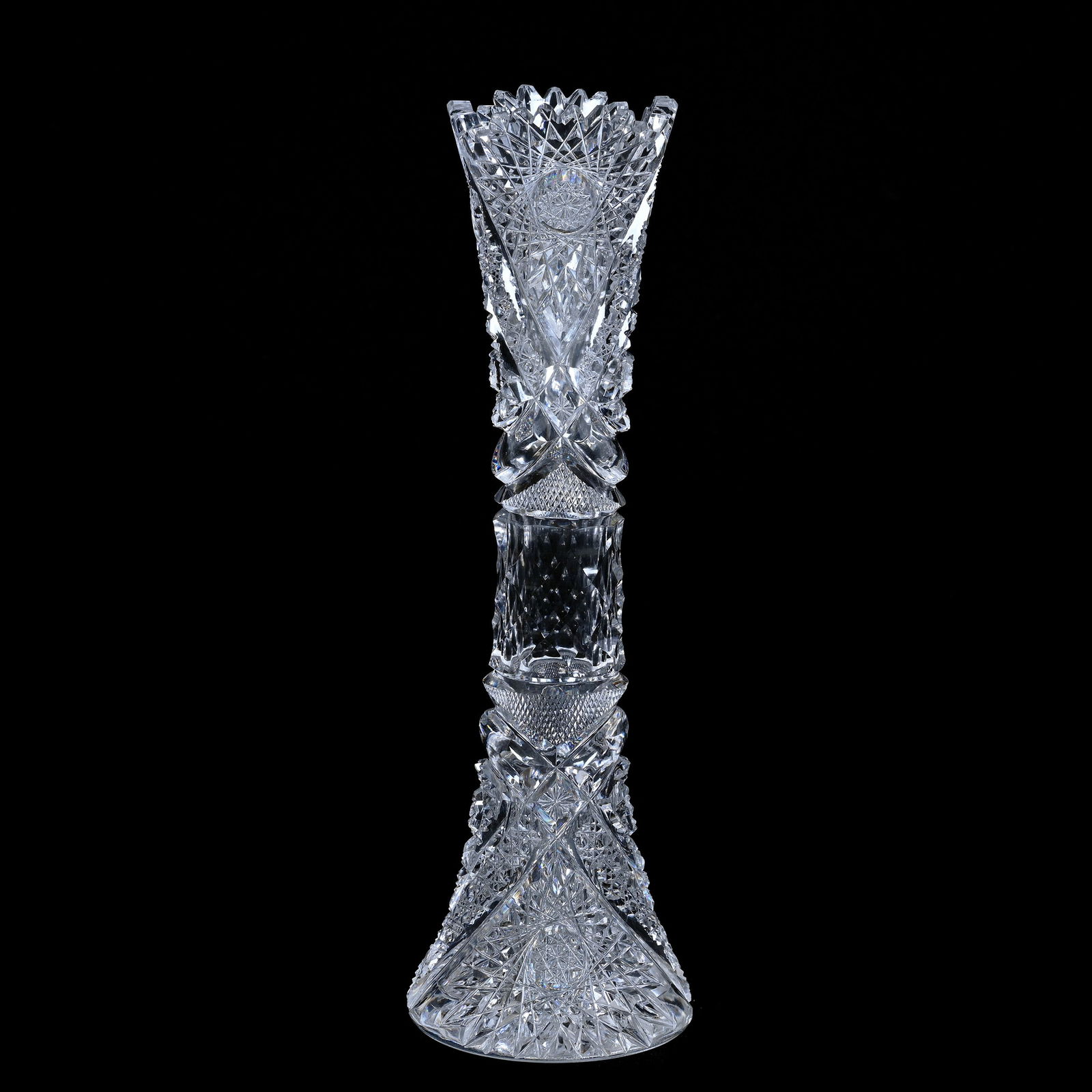 Vase, Cut Glass, Well Cut Hobstar, Cane, Strawberry Diamond, St. Louis Diamond, Tusk & Star Motif: Vase, American Brilliant Cut Glass, Well Cut Hobstar, Cane, Strawberry Diamond, St. Louis Diamond, Tusk & Star Motif, 10" x 3", Hobstar Base, One Tooth With Minor Side Chip, Sherry and The Late Elton