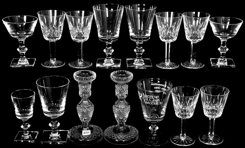 (15) CUT GLASS ITEMS: (15) CUT GLASS ITEMS (6) SIGNED HAWKES SQUARE BASED UNCUT STEMS - PAIR 7 1/2" WATERFORD CANDLESTICKS - (6) 5 3/4" WATERFORD STEMS - (1) 6 1/2" 1979 ACGA CONVENTION SOUVENIR