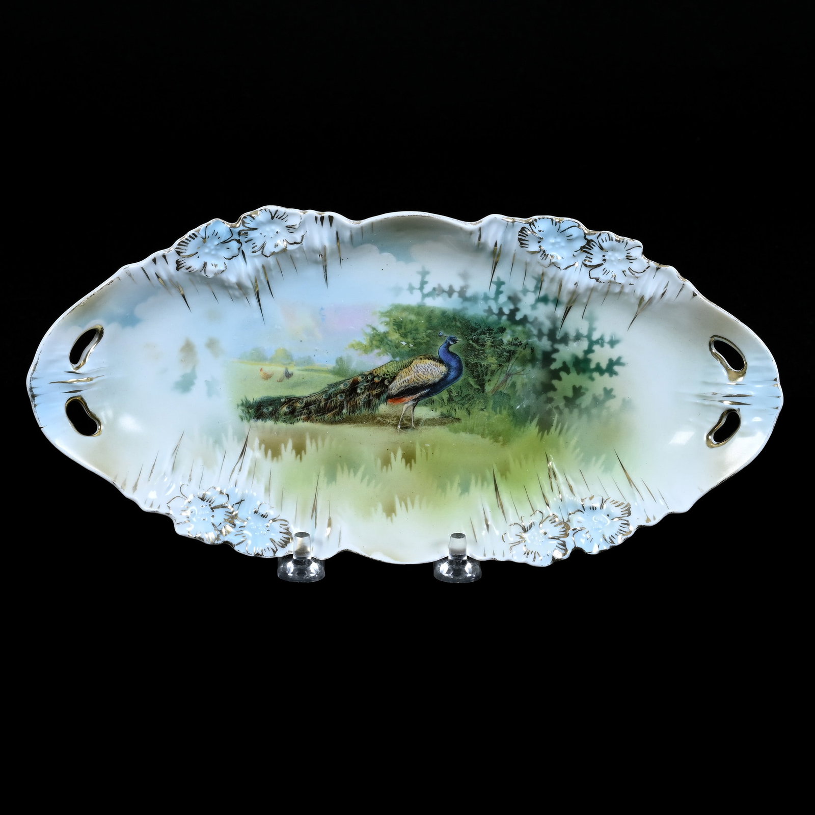 Relish Tray Marked R.S. Prussia, Icicle Mold, Peacock Scenic Decor: Relish Tray Marked R. S. Prussia, Icicle Mold, Peacock Scenic Decor, 9.5", Handle Crack, Neal And Barbara Smith Private Collection, Alabama.