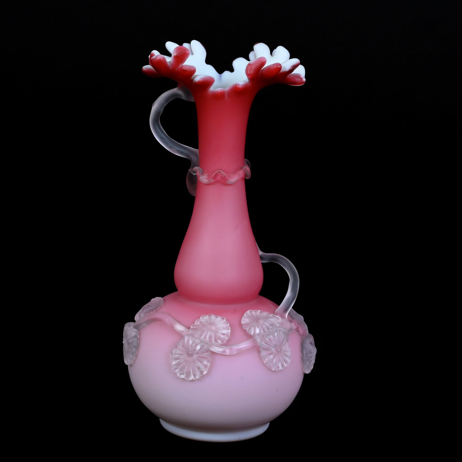 Novelty Ewer, Pink Satin Art Glass With Applied Branch And Blossom Decor, Flame Edge: Novelty Ewer, Pink Satin Art Glass With Applied Branch And Blossom Decor, Flame Edge, 9" x 4.25", Minor Fracture In The Applique Branch, Maurine and The Late Al Edmond Collection, IA.