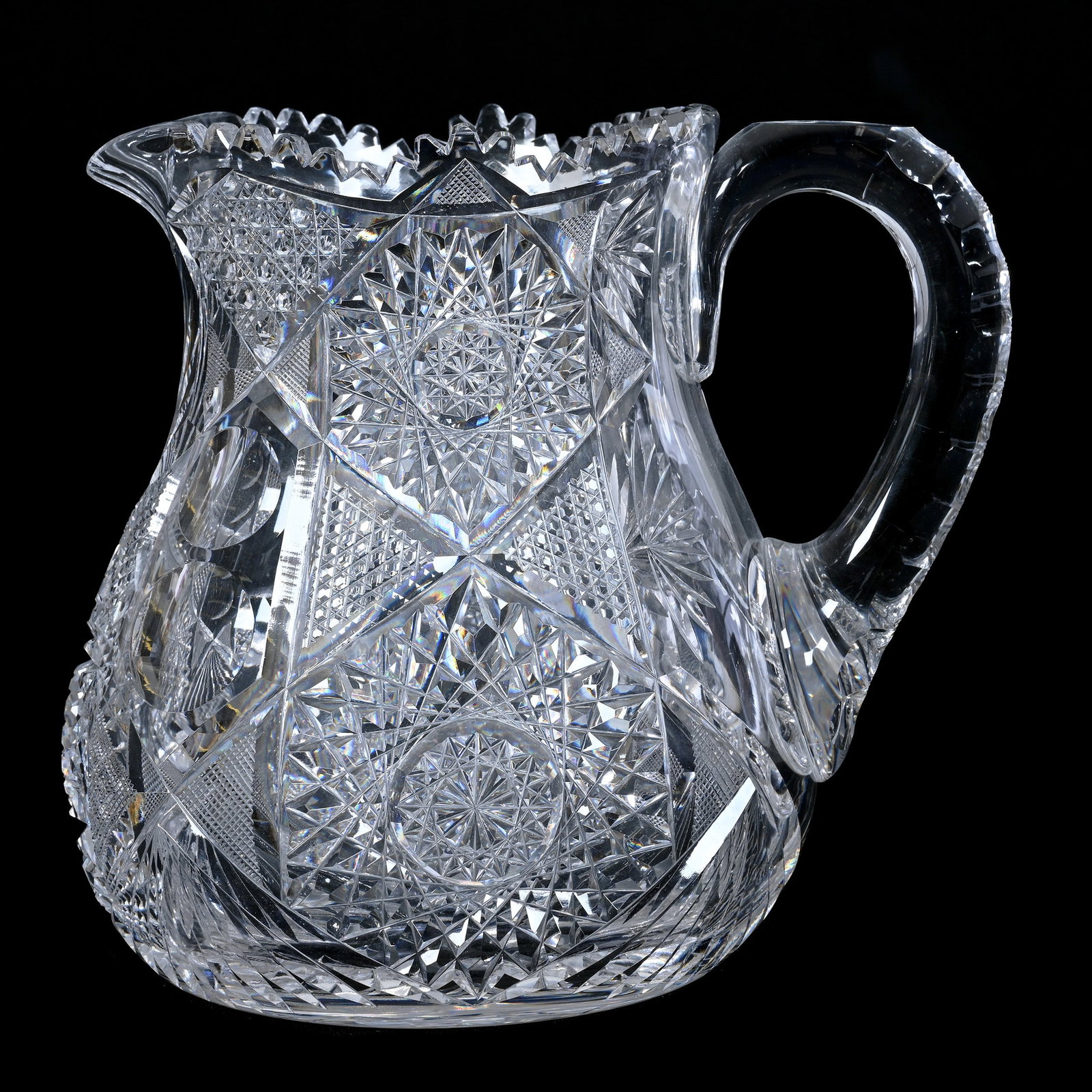 Pitcher, ABCG, Hobstar, Nailhead Diamond, Strawberry Diamond, Bullseye, Cane, And Fan Motif,: Pitcher, American Brilliant Cut Glass, Hobstar, Nailhead Diamond, Strawberry Diamond, Bullseye, Cane, And Fan Motif, 7.75" x 7.75", Hobstar Base, Maurine and The Late Al Edmond Collection, IA.