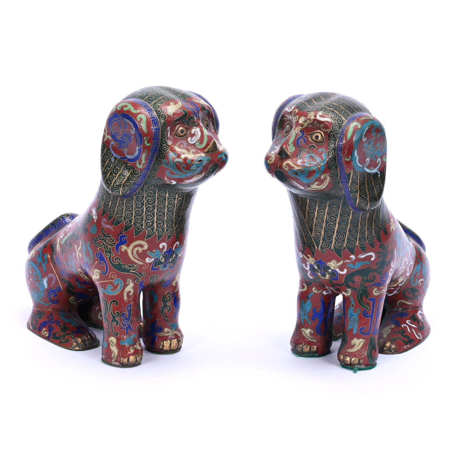 Pair Cloisonne Seated Dogs, Green And Red With Various Dragon And Scroll Designs: Pair Cloisonne Seated Dogs, Green And Red With Various Dragon And Scroll Designs, 9" x 9" x 4", One Dog With Hard To See Touch-Up On Left Flank, The Estate Of Rex And Mary Campbell, MO. All Proceeds O