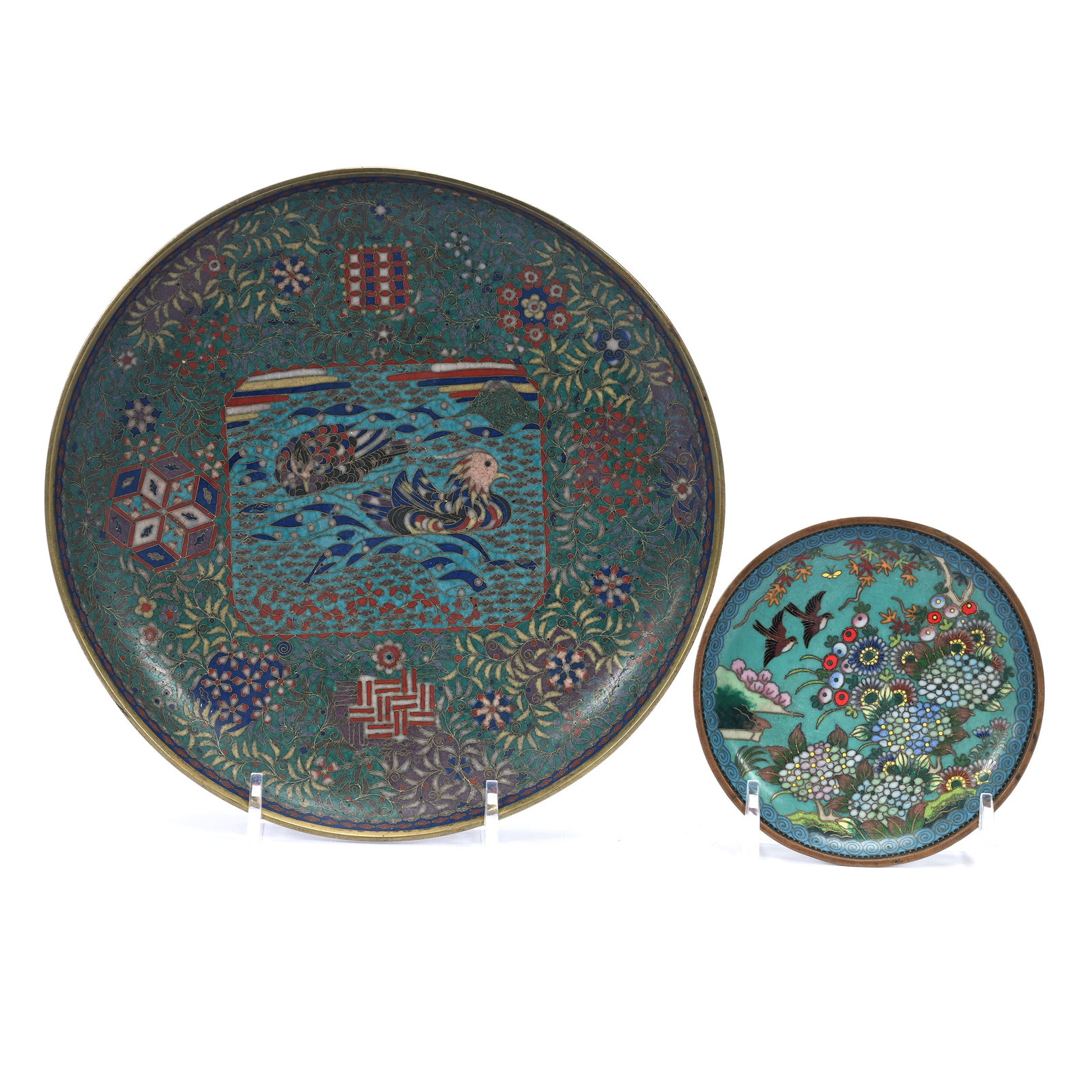 (2) Trays, Chinese Cloisonne - In The Style Of Qing Dynasty: (2) Trays, Chinese Cloisonne - In The Style Of Qing Dynasty, (1) 7.5" Duck Decor W/ Floral Border - Muted Colors Imply Early Example; (1) 4" Bird & Floral Design, The Estate Of Rex And Mary Campbell, 