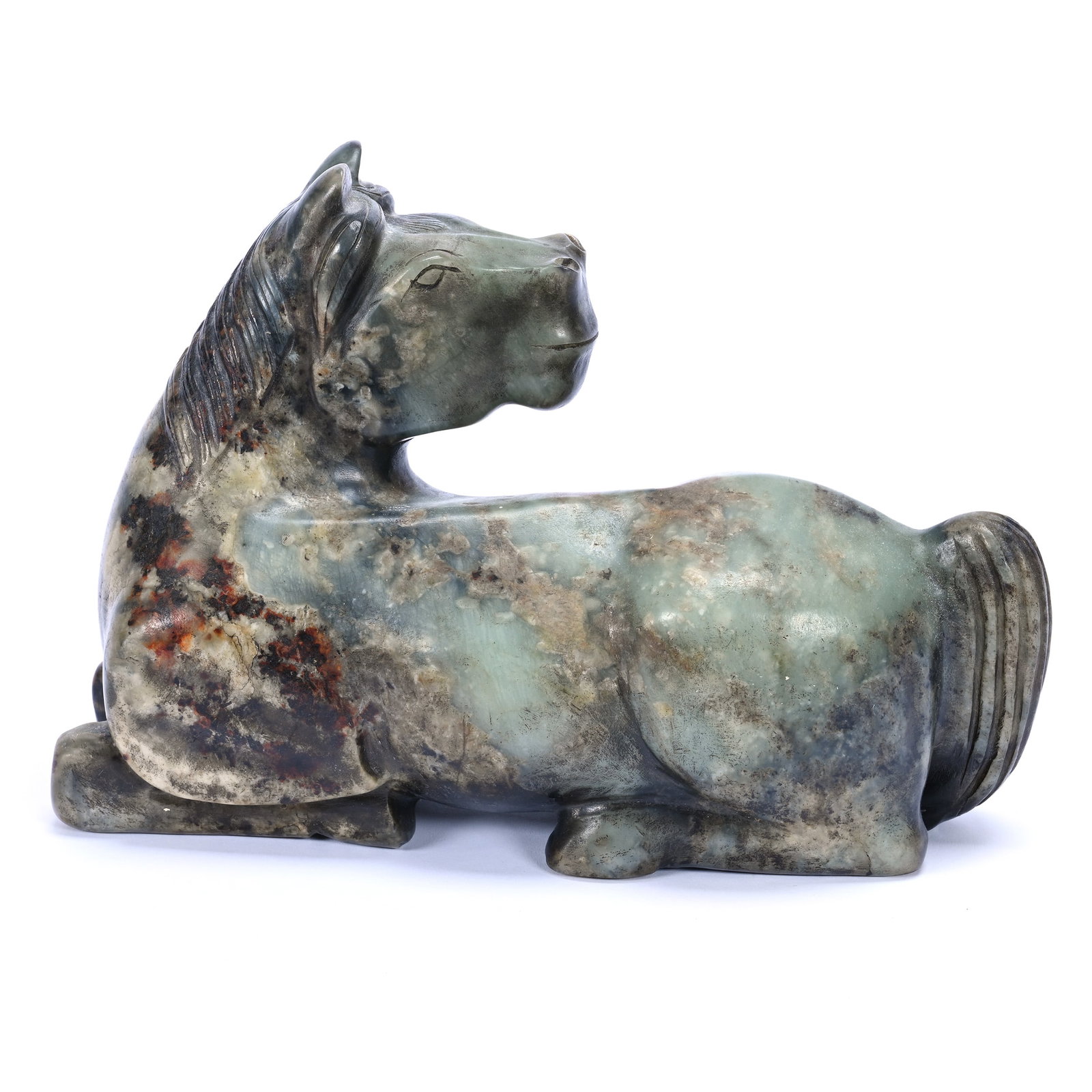 Chinese Nephrite Jade Horse Sculpture, Dark Green Mottled With Brown And White: Chinese Nephrite Jade Horse Sculpture, Dark Green Mottled With Brown And White, 7" x 10.5" x 3.75", Horse At Rest With Head Reversed Over Its Back, Total Weight Over 10 Pounds, The Estate Of Rex And M
