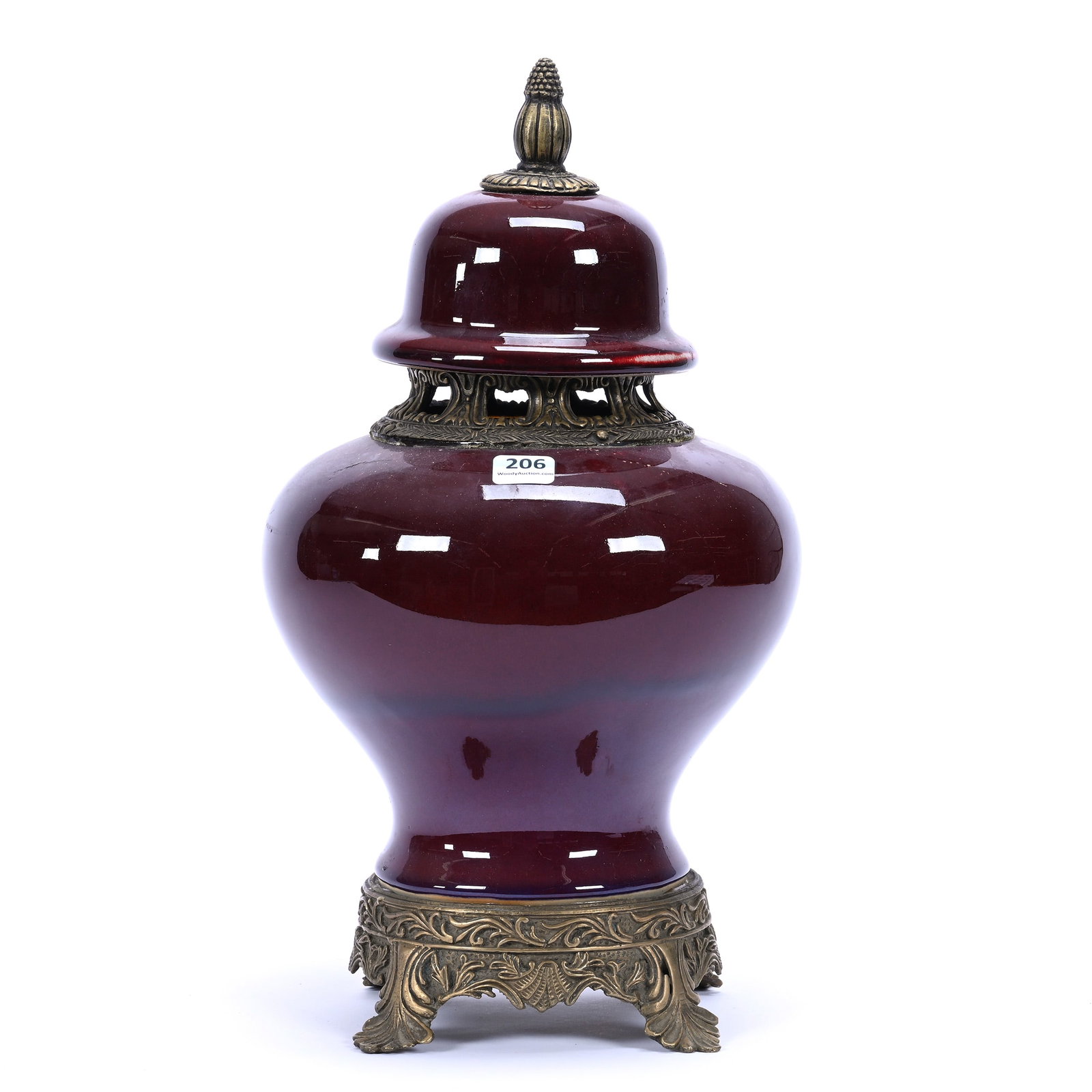 Covered Urn, Chinese Porcelain, Oxblood Glaze, Gilt Metal Mounts, In The Style Of Kangxi: Covered Urn, Chinese Porcelain, Oxblood Glaze, Gilt Metal Mounts, In The Style Of Kangxi, 14.25" x 8", 20th Century, The Estate Of Rex And Mary Campbell, MO. All Proceeds Of This Auction Go To Benefit