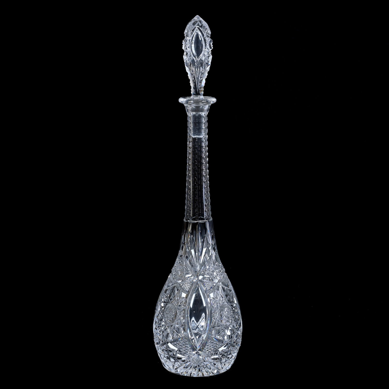 Decanter, BPCG, Pattern Resembles Grecian Pattern With Hobstar And Tusk Design: Decanter, Brilliant Period Cut Glass, Pattern Resembles Grecian Pattern With Hobstar And Tusk Design, 17.75" x 4.5", Pattern Cut Stopper, Ray Cut Base, Grady And Annette Hite Collection, NC.