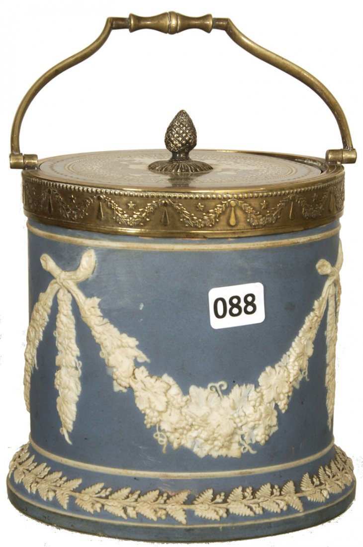 6 1/4" UNMARKED WEDGWOOD STYLE BISCUIT JAR: 6 1/4" UNMARKED WEDGWOOD STYLE BISCUIT JAR BLUE AND WHITE WITH ELABORATE VINTAGE GARLAND MOTIF - SILVERPLATE LID AND BAIL - MINOR BASE CHIP