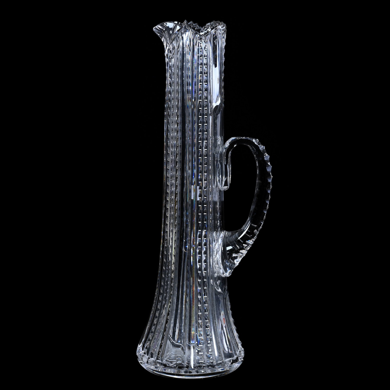 Champagne Tankard, American Brilliant Cut Glass, Alternating Pillar And Prism Motif: Champagne Tankard, American Brilliant Cut Glass, Alternating Pillar And Prism Motif, 16.75" x 6", Triple Notched Handle, Hobstar Base, Nearly A Pattern Match To Lot #141, Estate Of Paul Pellet, Texas.
