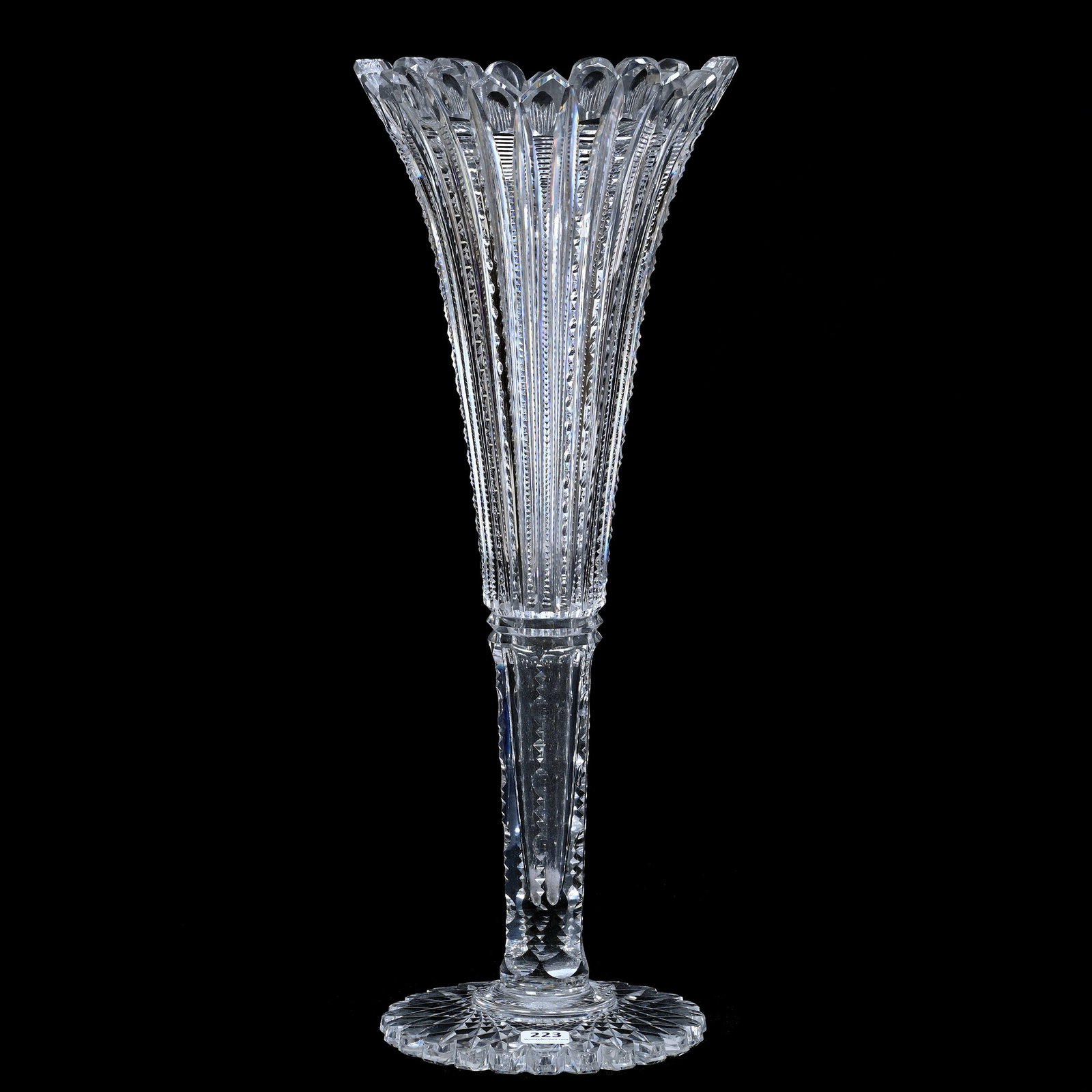 Trumpet Vase, American Brilliant Cut Glass, Prism Cut Body With Punty Rim Border: Trumpet Vase, American Brilliant Cut Glass, Prism Cut Body With Punty Rim Border, 18.25" x 7", Prism Cut Straight Stem, Scalloped Hobstar Foot, Estate Of Paul Pellet, Texas.