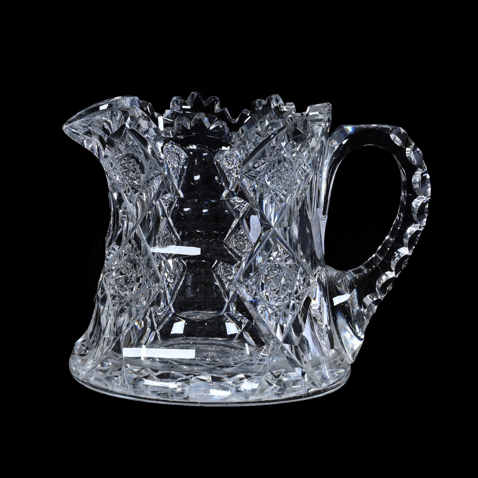 Creamer, American Brilliant Cut Glass, Signed Hawkes Queens Pattern: Creamer, American Brilliant Cut Glass, Signed Hawkes Queens Pattern, 3.75" x 4.75", Triple Notched Handle, Hobstar Base, Estate of Paul Pellet, Texas.