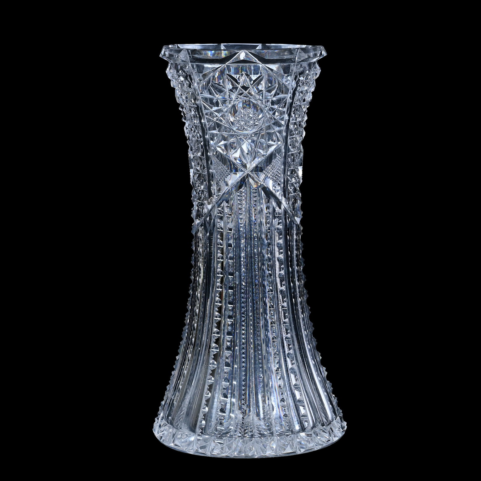 Vase, American Brilliant Cut Glass, Prism Cut Body With Panels Of Hobstar Highlights: Vase, American Brilliant Cut Glass, Prism Cut Body With Panels Of Hobstar Highlights, 8" x 3.75", Hobstar Base, Estate of Paul Pellet, Texas.