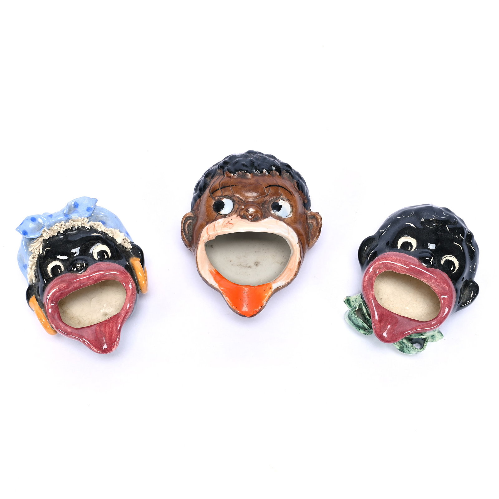 (3) Figural Ashtrays, Black Memorabilia: (3) Figural Ashtrays, Black Memorabilia, 3" approximately, (2) Souvenirs Of New Orleans Marked Handmade-Castle, (1) Marked Japan, Ear Chip, Missouri Private Collection.