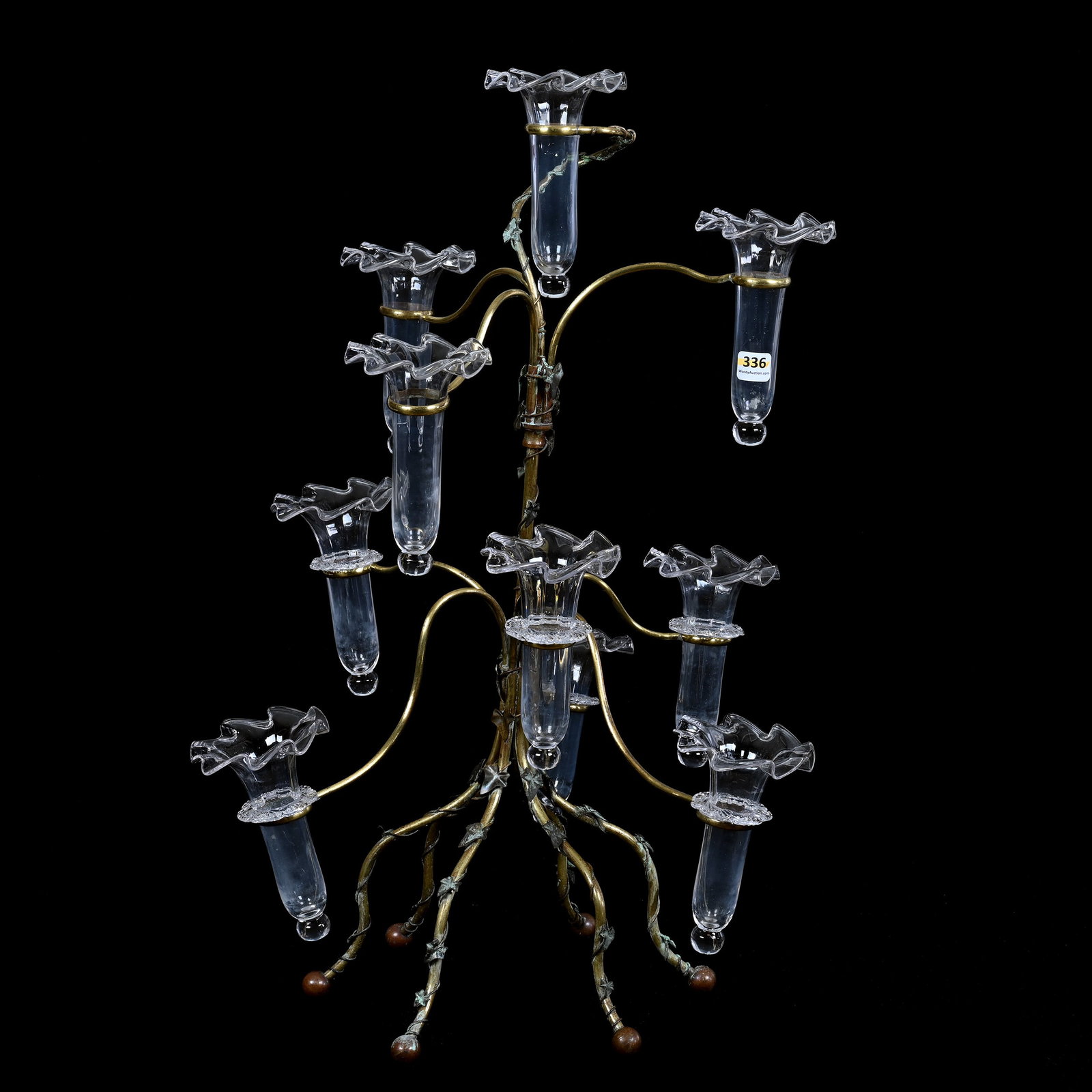 Epergne, Ten Lily, Brass Frame With Wrapped Ivy Decor: Epergne, Ten Lily, Brass Frame With Wrapped Ivy Decor, 23.5" x 17", Ten Removable Clear Glass Lilies, Six Lilies Have Rigoree, Four Do Not, Exactly As Shown In The Elegant Epergne, Page 88, Stourbridg