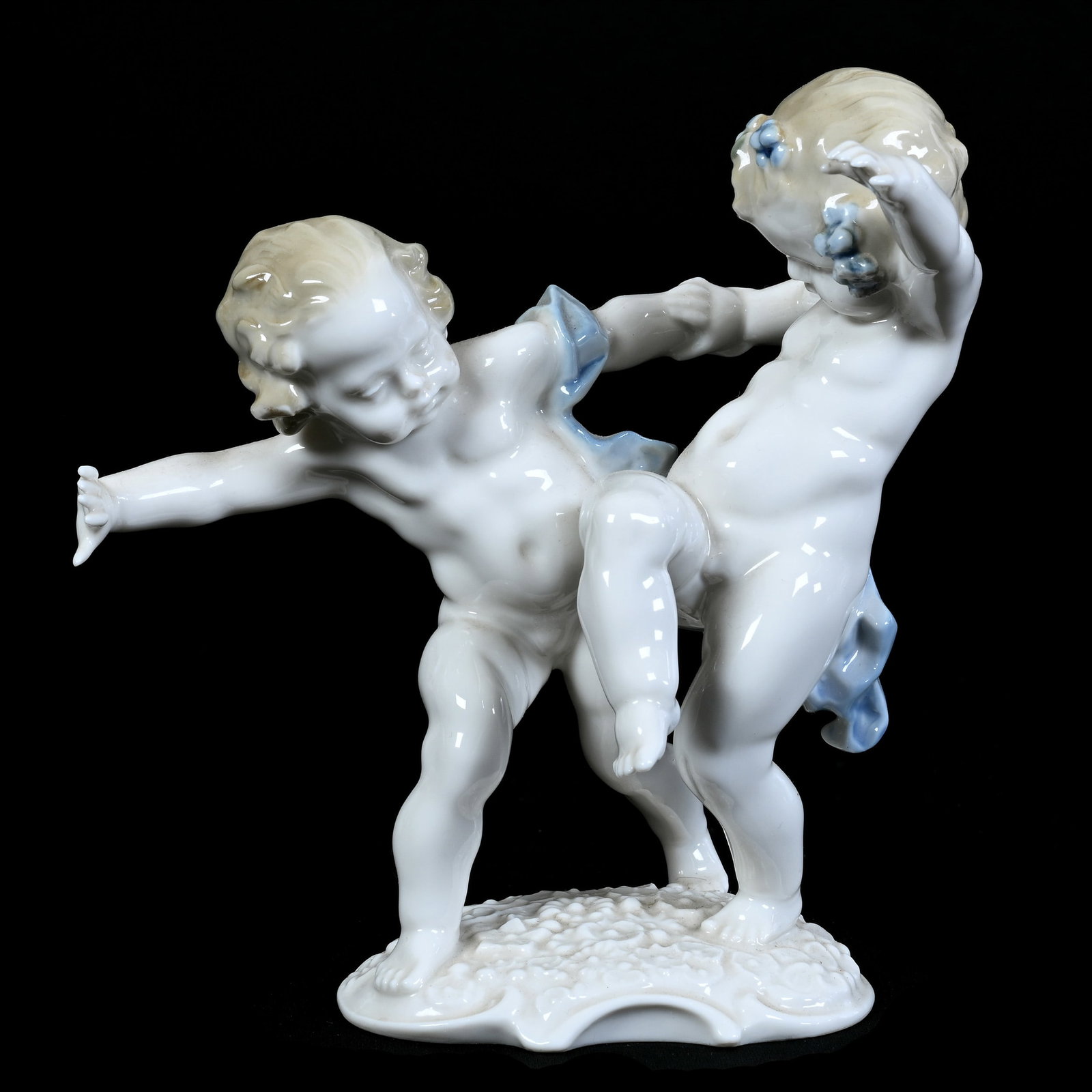 Figural Group Marked Hutschenreuther, Figures Of Two Puttis Playing: Figural Group Marked Hutschenreuther, Figures Of Two Puttis Playing, 6.5" x 5.75", Artist Marked "K. Tutter", Illinois Private Collection.