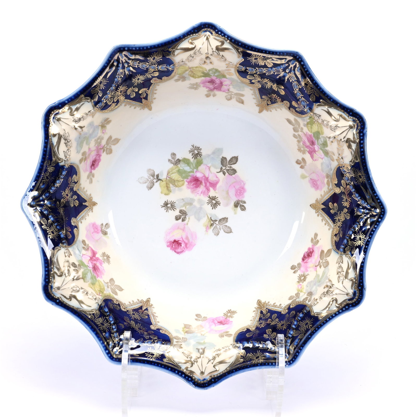 Bowl, Marked R.S. Prussia, Swag and Tassel Mold: Bowl, Marked R.S. Prussia, Swag and Tassel Mold, 11", Cream And White Tones With Cobalt Blue Border, Pink Rose Decor, Nice Gold Stencil Highlights, Christine And The Late Bob Welter Collection, Texas.
