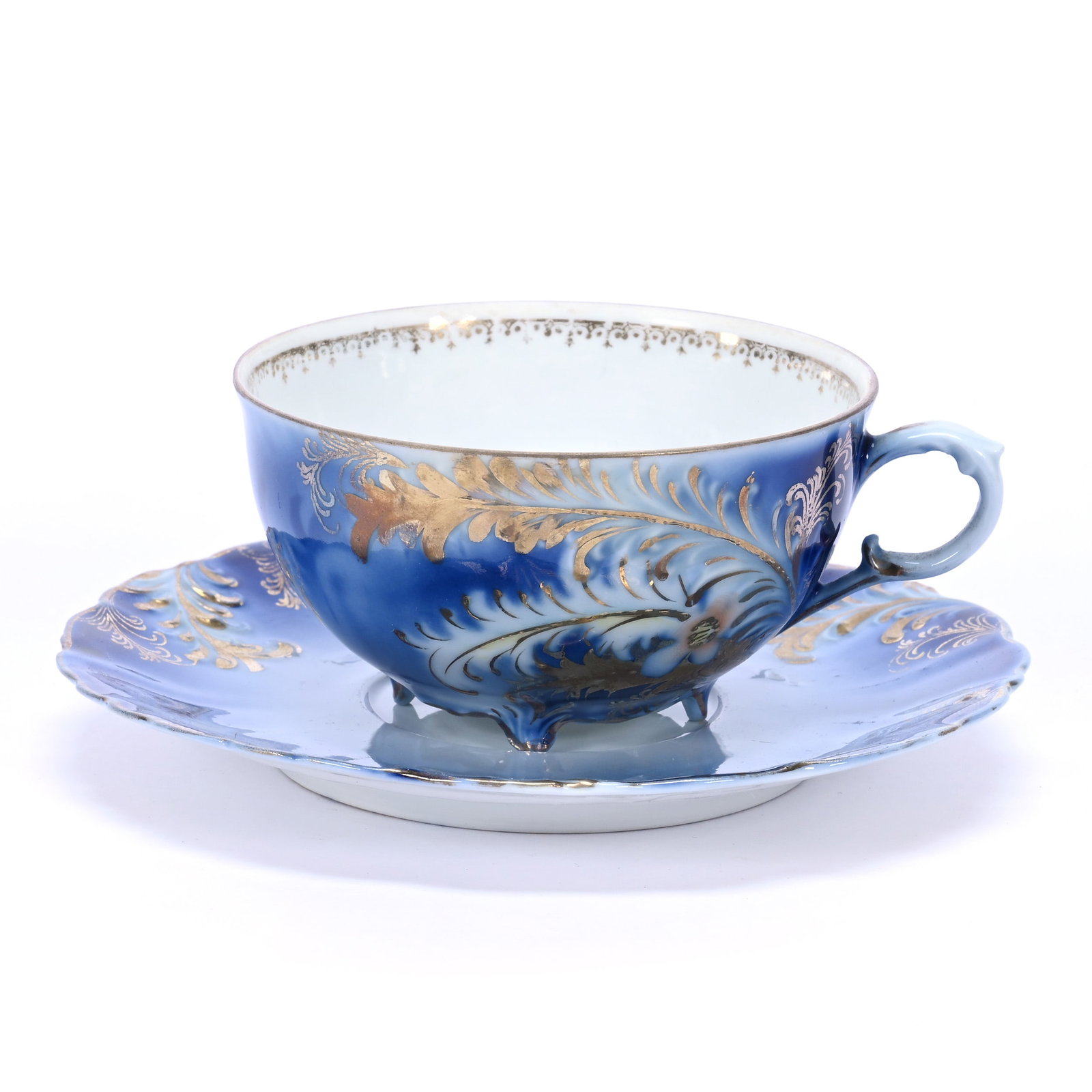 Coffee Cup and Saucer, Unmarked R.S. Prussia, Plume Mold: Coffee Cup and Saucer, Unmarked R.S. Prussia, Plume Mold, 2.25" x 5.5", Cobalt Blue With Gold Stencil Highlights, Base Chip On Saucer, Christine And The Late Bob Welter Collection, Texas.