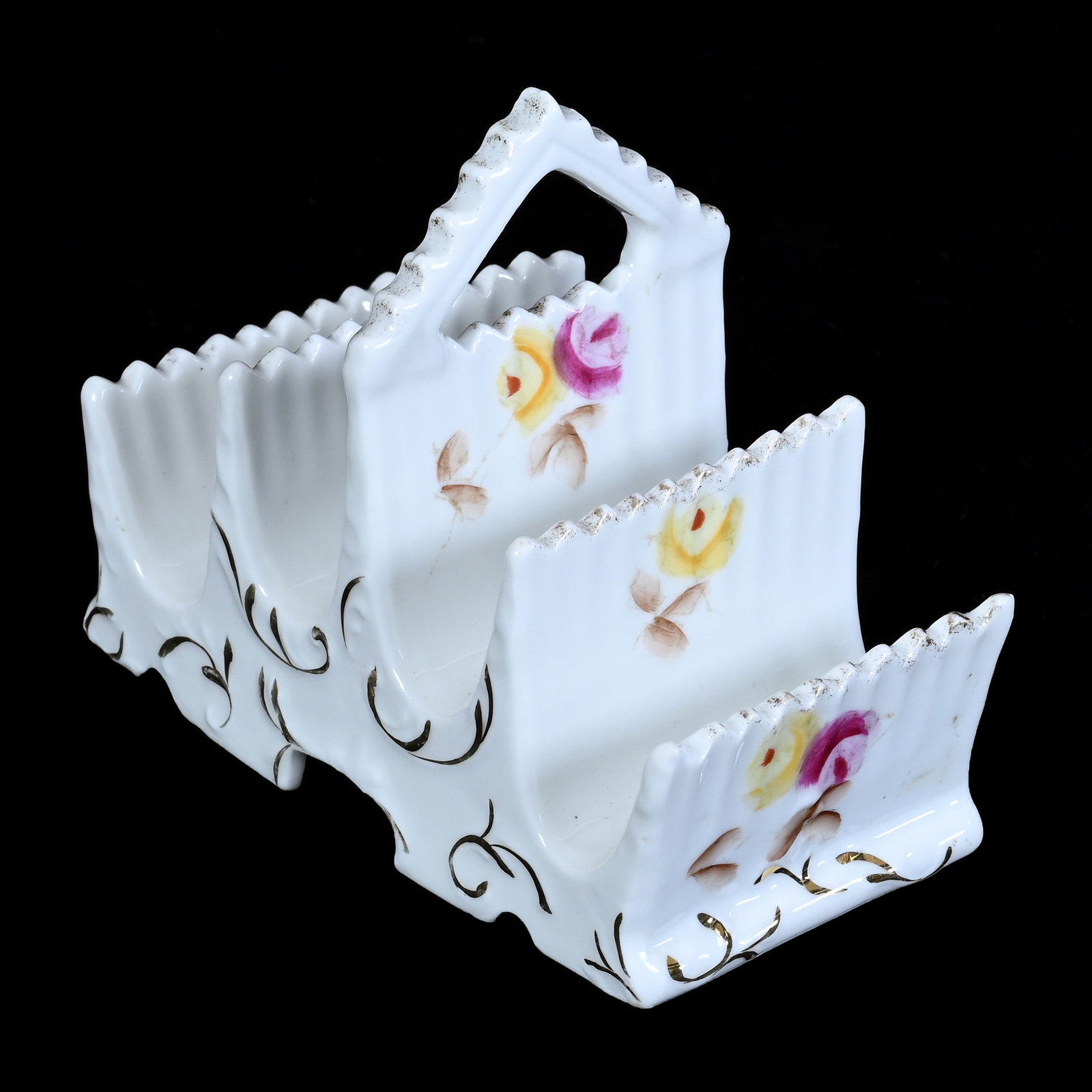 Toast Rack, Early Unmarked R.S. Prussia, White With Rose Decor and Gold Stencil Highlights: Toast Rack, Early Unmarked R.S. Prussia, White With Rose Decor and Gold Stencil Highlights, 4.25" x 5" x 2.75", Christine And The Late Bob Welter Collection, Texas.