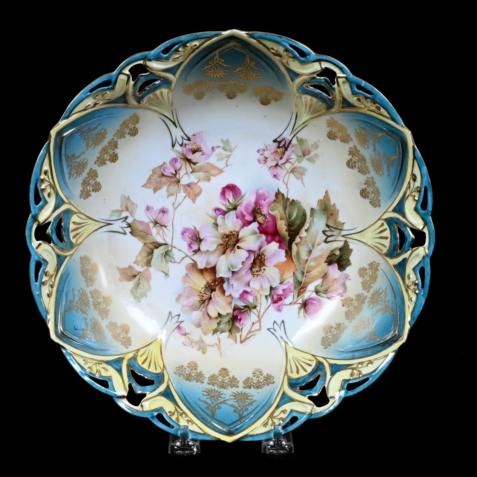Bowl, Unmarked R.S. Prussia, Reticulated Edge, Floral Decor With Gold Stencil Highlights: Bowl, Unmarked R.S. Prussia, Reticulated Edge, Floral Decor With Gold Stencil Highlights, 9.75", Cream, Yellow, And Blue Tones, Neal and Barbara Smith Private Collection, Alabama.