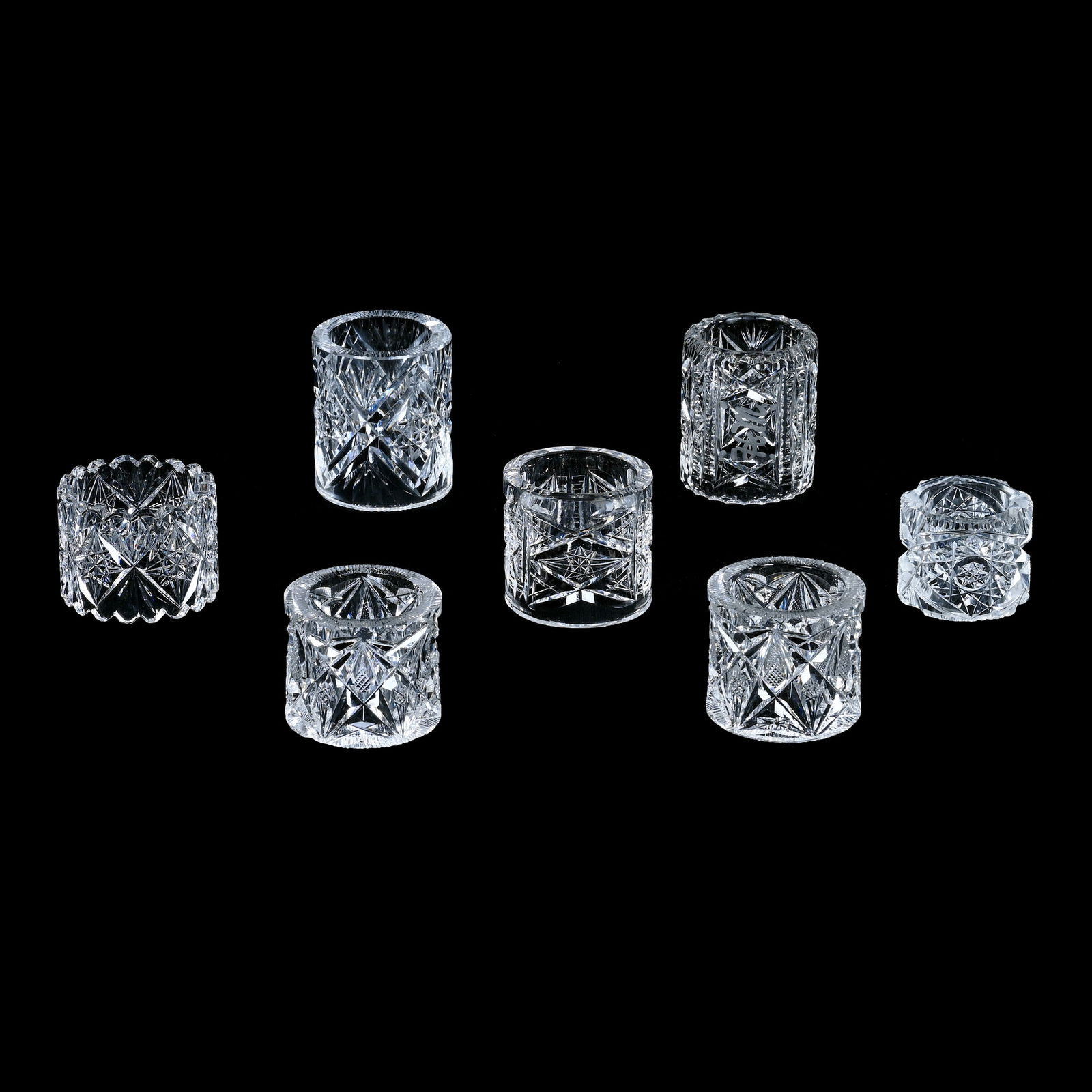 (7) Napkin Ring Holders, ABCG: (7) Napkin Ring Holders, American Brilliant Cut Glass, Sizes Range From 1.5" - 2.5", (1) Matching Pair, (5) Individual Rings, See Photos For Details, One With Rim Roughness, Eleanor Eulau Collection.