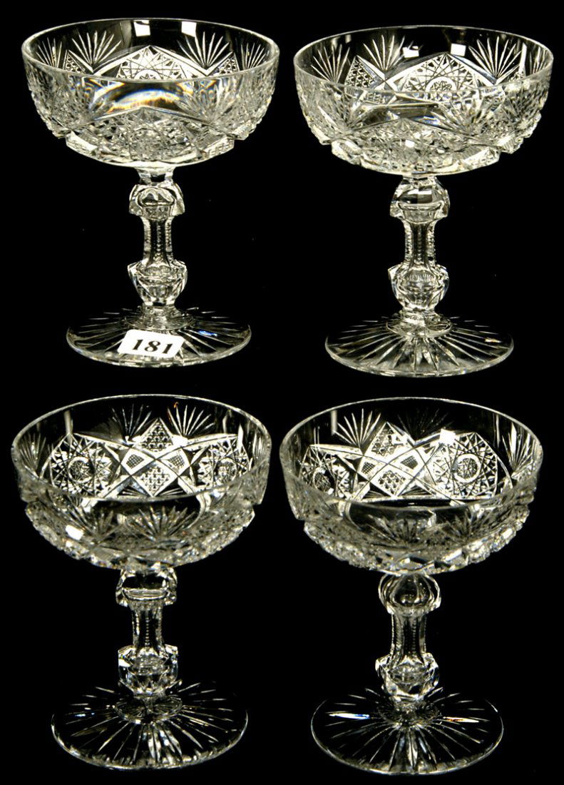 (4) 4 1/4" AMERICAN BRILLIANT CUT GLASS CHAMPAGNE GLASS: HOBSTAR, STRAWBERRY DIAMOND, NAIL HEAD DIAMOND AND FAN MOTIF - APPLE CORE STEMS - CLEAR BLANKS