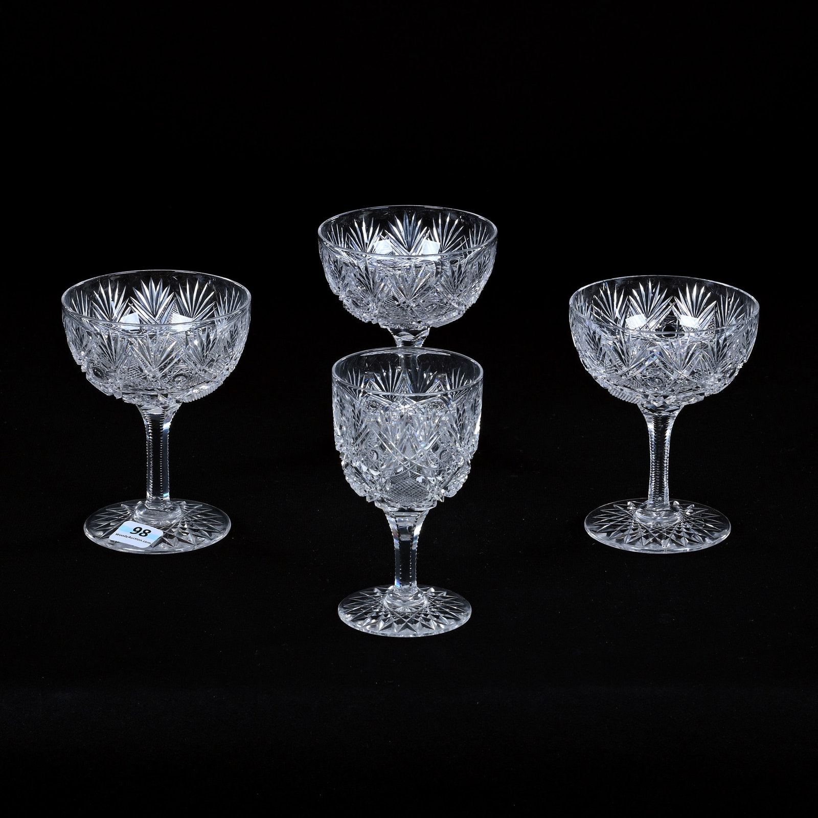 (4) Stems, American Brilliant Cut Glass, All In Bakers Gothic Pattern By Clark, All With Hobstar: (4) Stems, American Brilliant Cut Glass, All In Bakers Gothic Pattern By Clark, All With Hobstar Foot, (3) 4.5" x 3.5" Champagne Stems, (1) 4.5" x 2.625" Wine Stem, Eleanor Eulau Collection.