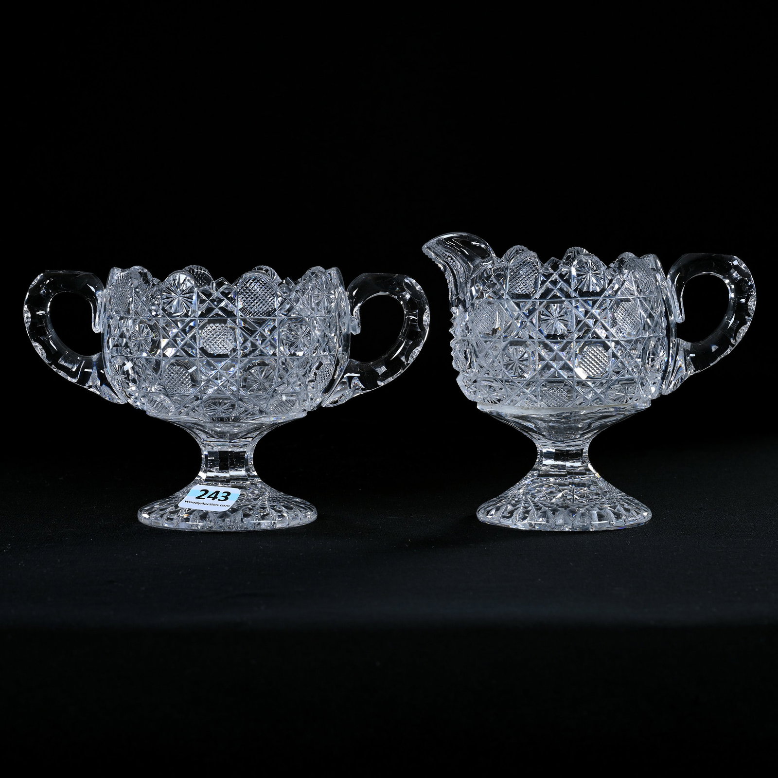 Pedestal Creamer And Sugar Set, American Brilliant Cut Glass, Cane Pattern: Pedestal Creamer And Sugar Set, American Brilliant Cut Glass, Cane Pattern, 4.75" x 6.5", Hobstar Cut Foot, One Sugar Handle With Crack, Eleanor Eulau Collection.