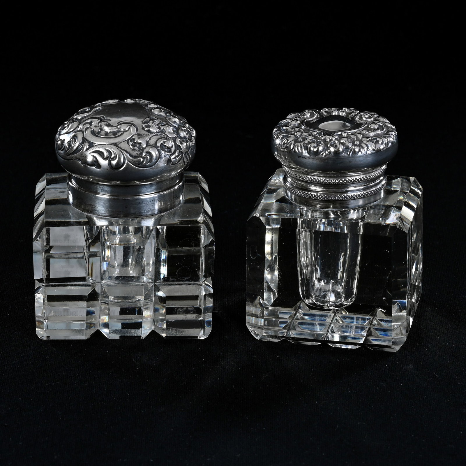 (2) Square Inkwells, Not Matching, American Brilliant Cut Glass, Block Type Pattern On Each: (2) Square Inkwells, Not Matching, American Brilliant Cut Glass, Block Type Pattern On Each, 2.5" x 2" approximately, (1) Sterling Flip Lid Marked Wallace, (1) Sterling Flip Lid Marked La Pierre, Elea