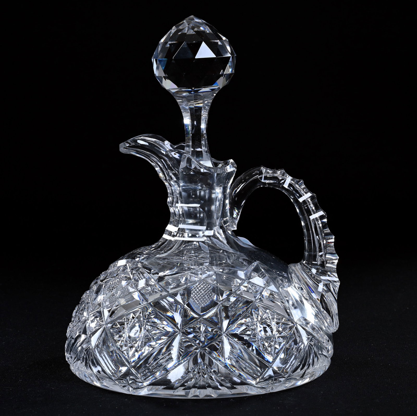 Ship's Decanter, American Brilliant Cut Glass, Hobstar, Strawberry Diamond, Star, Miter And Fan: Ship's Decanter, American Brilliant Cut Glass, Hobstar, Strawberry Diamond, Star, Miter And Fan Motif, 8.25" x 6.5", Ray Cut Base, Some Roughness On Handle, Eleanor Eulau Collection.