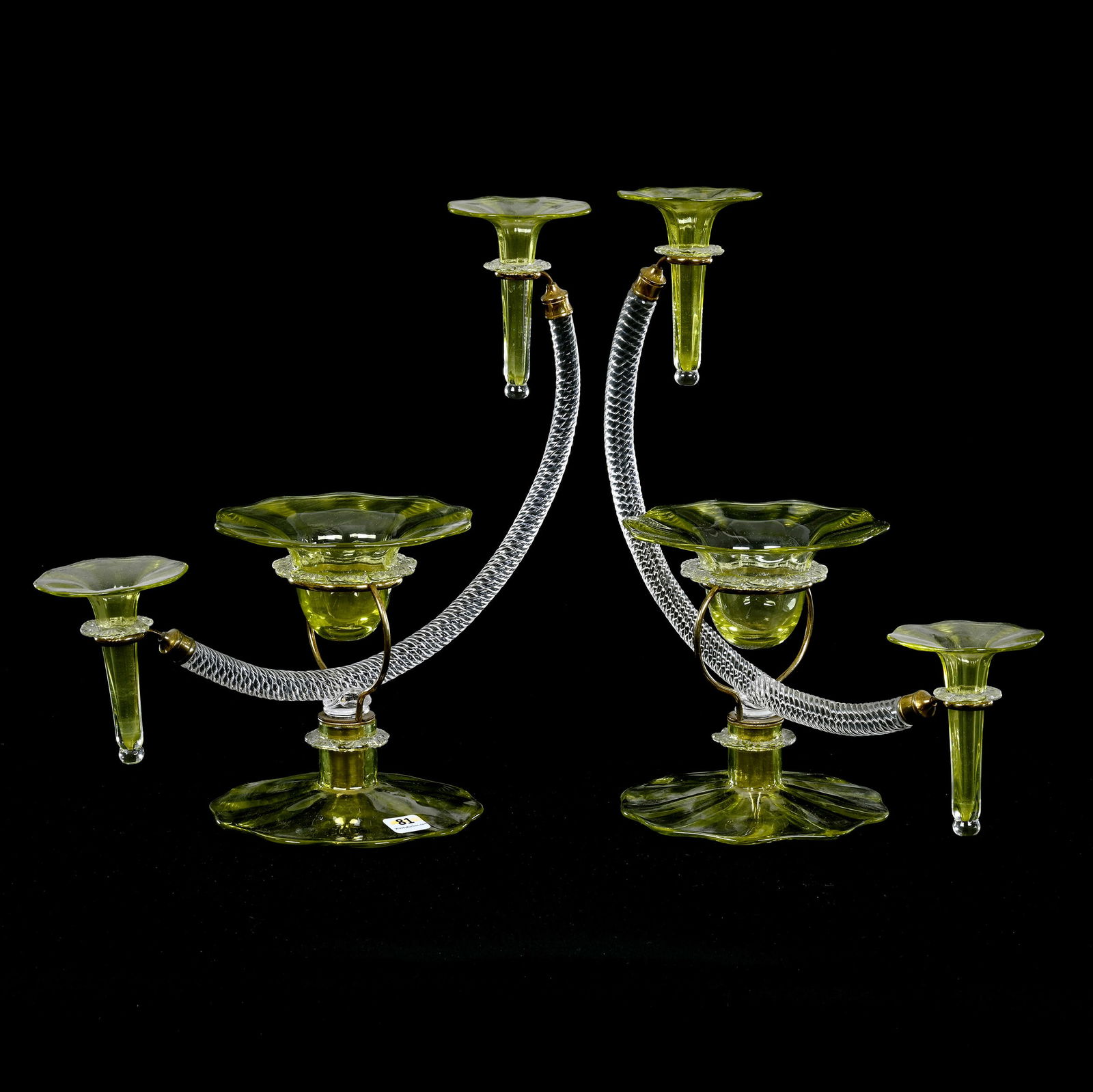 Pair Of Epergnes, Yellow And Clear Art Glass Featuring A Foot With Each Holding Clear Rope Strand: Pair Of Epergnes, Yellow And Clear Art Glass Featuring A Foot With Each Holding Clear Rope Strand, 13" x 12", Gilt Metal Fittings Holding Removable Lilies And Center Bowl, A Copy Of The Book, The Eleg