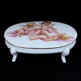 Footed Oval Covered Box, Unmarked Bavaria, White With Hand Painted Cherub Scenic Decor