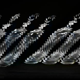 (4) Danish Hand Blown Decanters, Alternate Names For Bottles Are "Cluk Cluk" Or "Pinch Decanter": (4) Danish Hand Blown Decanters, Alternate Names For Bottles Are "Cluk Cluk" Or "Pinch Decanter", 13" x 4.5", Attributed To Holmegaard, Clear Glass, All Have Polished Pontil Bases, Harold & Louise Alv