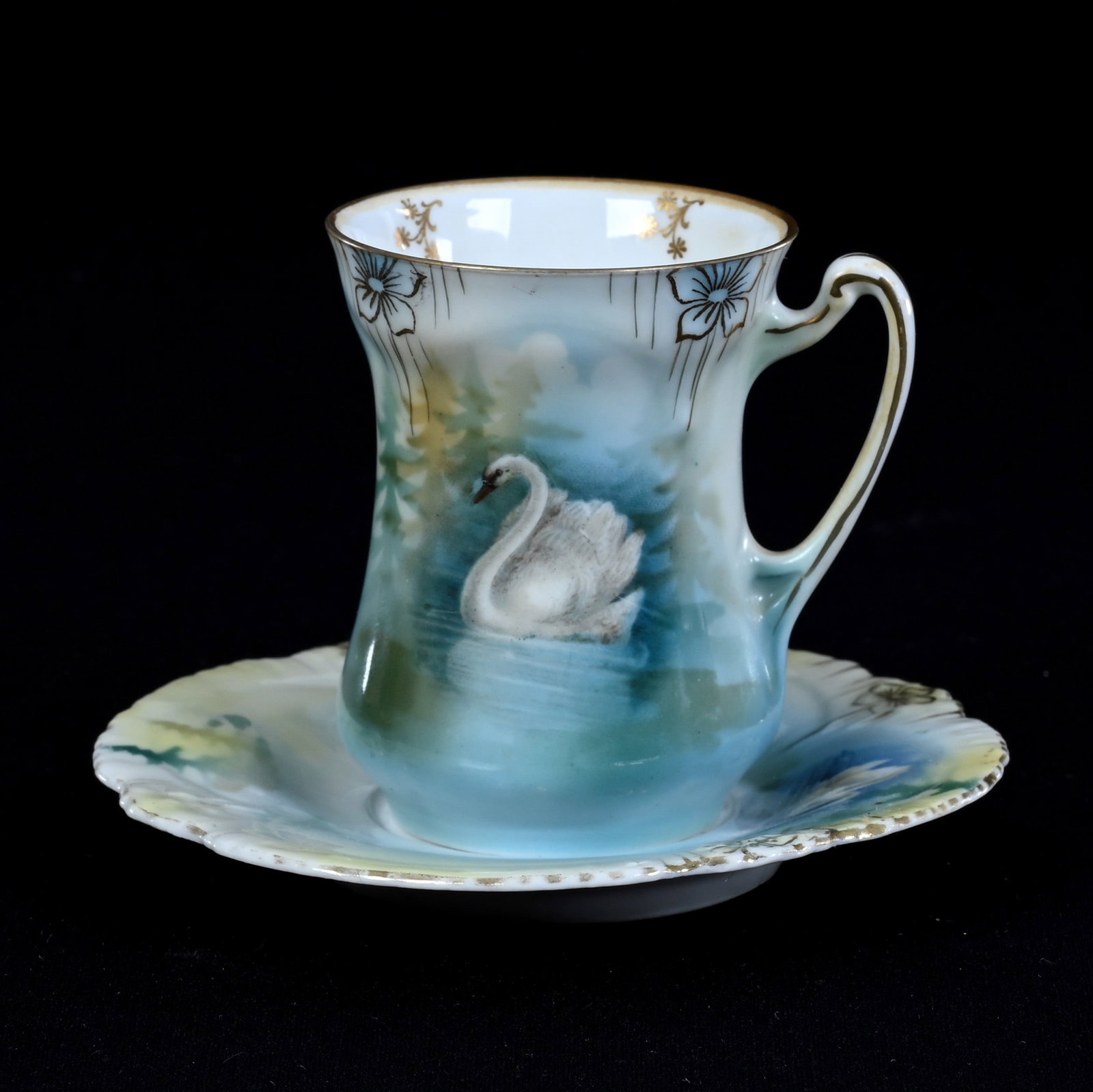 Chocolate Cup And Saucer, Marked R.S. Prussia, Icicle Mold: Chocolate Cup And Saucer, Marked R.S. Prussia, Icicle Mold, 3.25" x 4.5", Swan Scenic Decor, Cup Is In Good Condition, Saucer Has Been Completely Restored, Lou And The Late Norman Darland, TN.