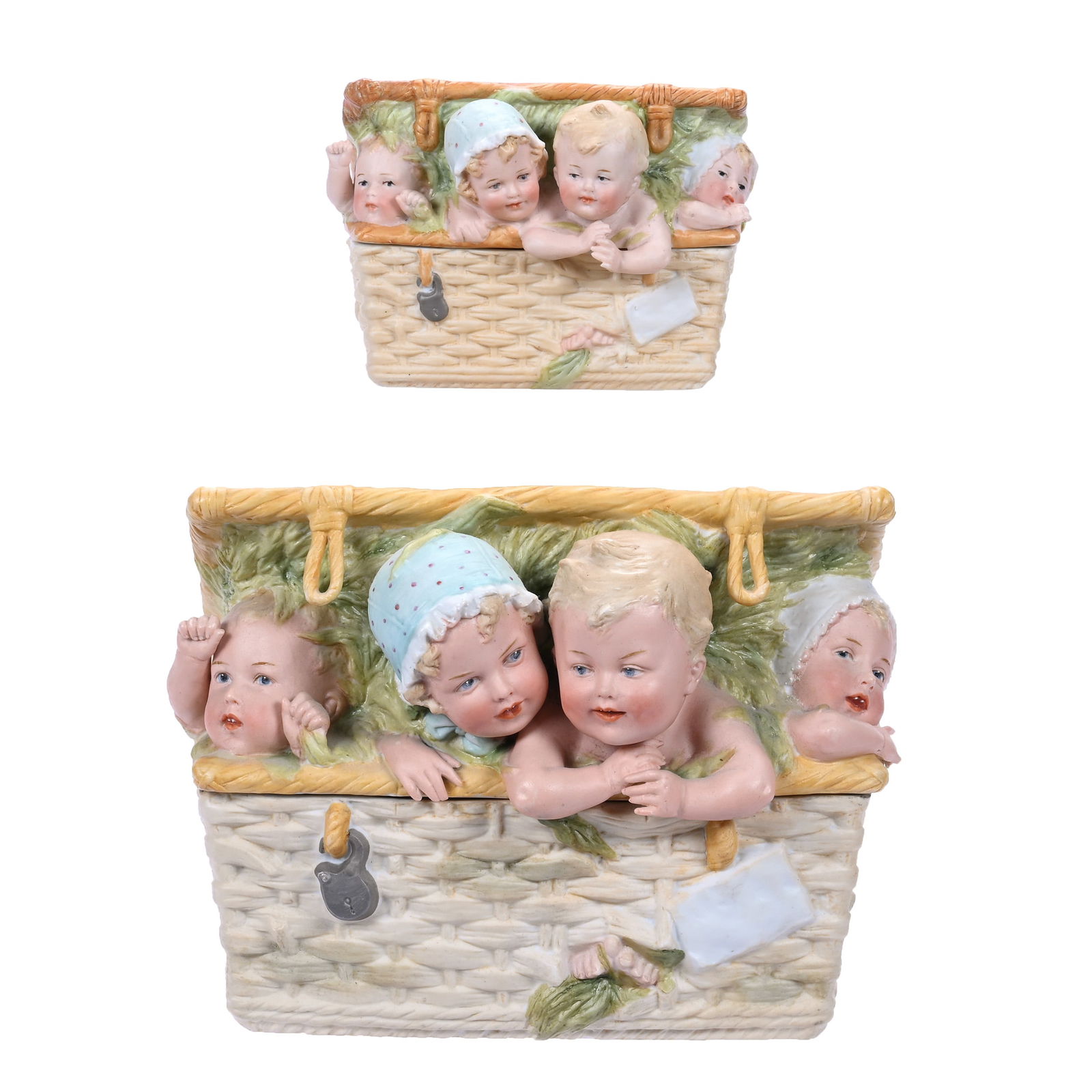 (2) Figural Heubach Bisque Covered Boxes: (2) Figural Heubach Bisque Covered Boxes, N/A, Each Box Features A Basket Holding Four Emerging Children, (1) 6.75” x 8.5” x 6", One Child Has One Finger Chip, (1) 4” x 5.5” x