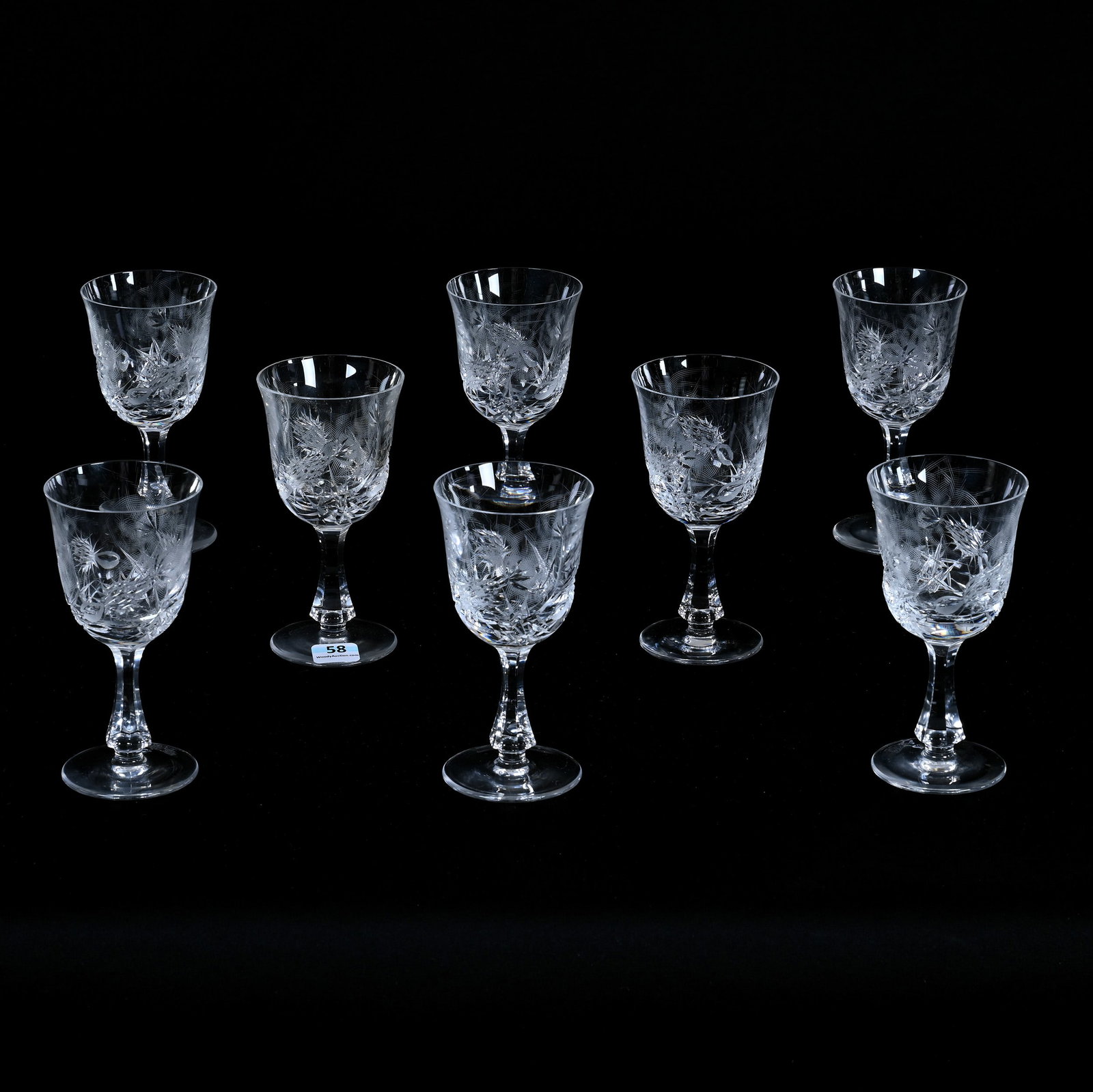 (8) Wine Stems, Cut Glass, Engraved Thistle Decor: (8) Wine Stems, Cut Glass, Engraved Thistle Decor, 5.25" x 2.625", Attributed To Josef Svarc, Circa 1970, One Wine With Base Chip, Arkansas Private Estate Collection.