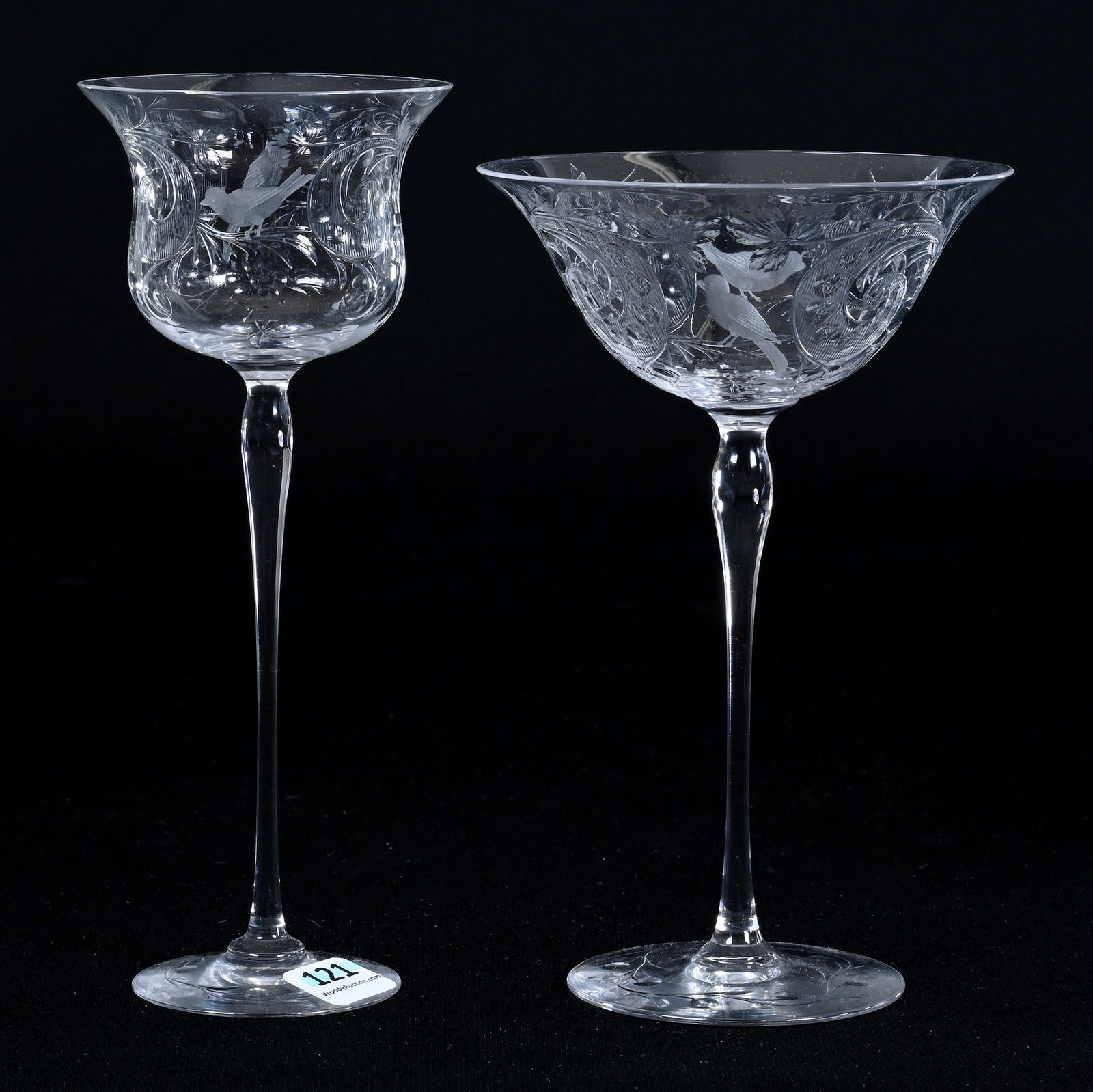(2) Stems, American Brilliant Cut Glass, Signed Libbey: (2) Stems, American Brilliant Cut Glass, Signed Libbey, Matched Pattern Featuring Bird, Floral, And Rococo Design, Delicate Stems, Pattern Engraved Foot, (1) Wine Stem 7.75" x 3.125", (1) Champagne St