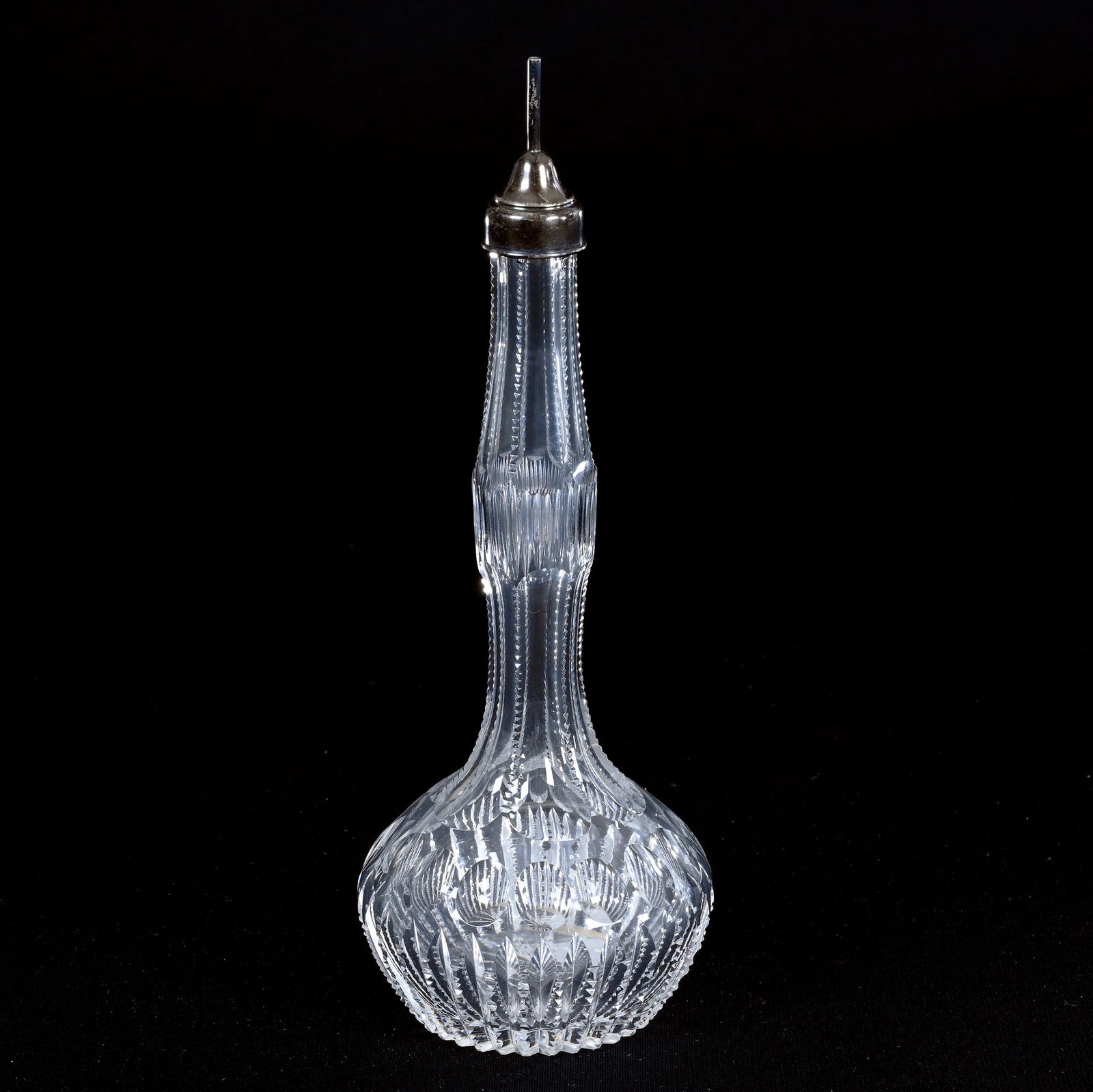 Barner's Bottle, American Brilliant Cut Glass, Punty And Prism Motif: Barner's Bottle, American Brilliant Cut Glass, Punty And Prism Motif, 9" x 3.25", Ray Cut Base, C.F. Monroe Sterling Silver Top, Joan Steskal Collection, CA.